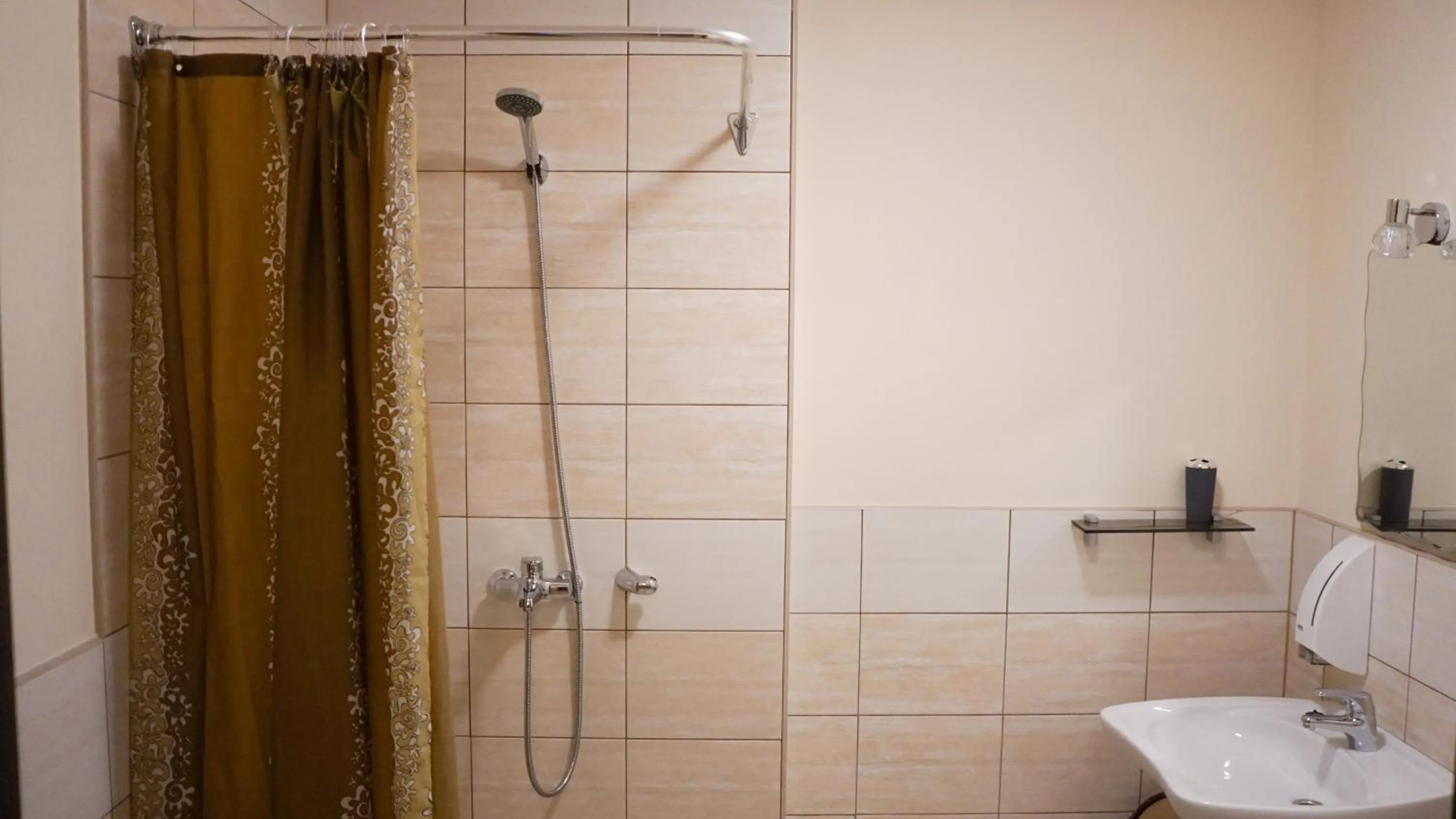 Shower in Bella Riga Hotel with Self-Check in