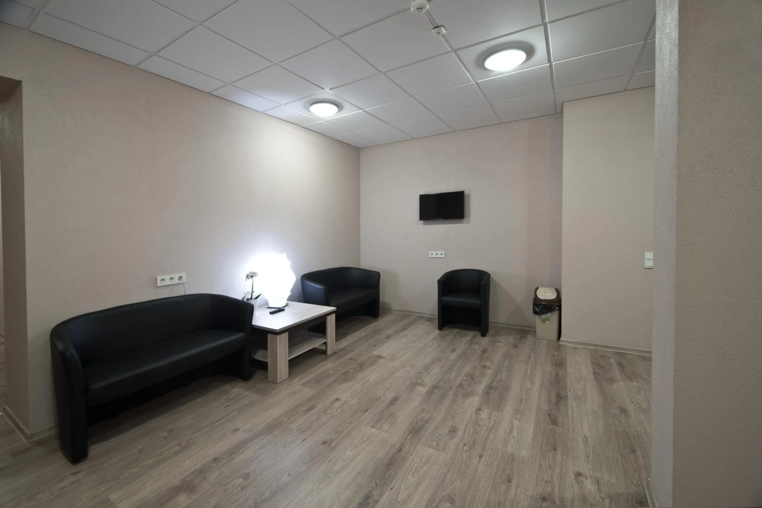 Communal lounge/ TV room in Bella Riga Hotel with Self-Check in