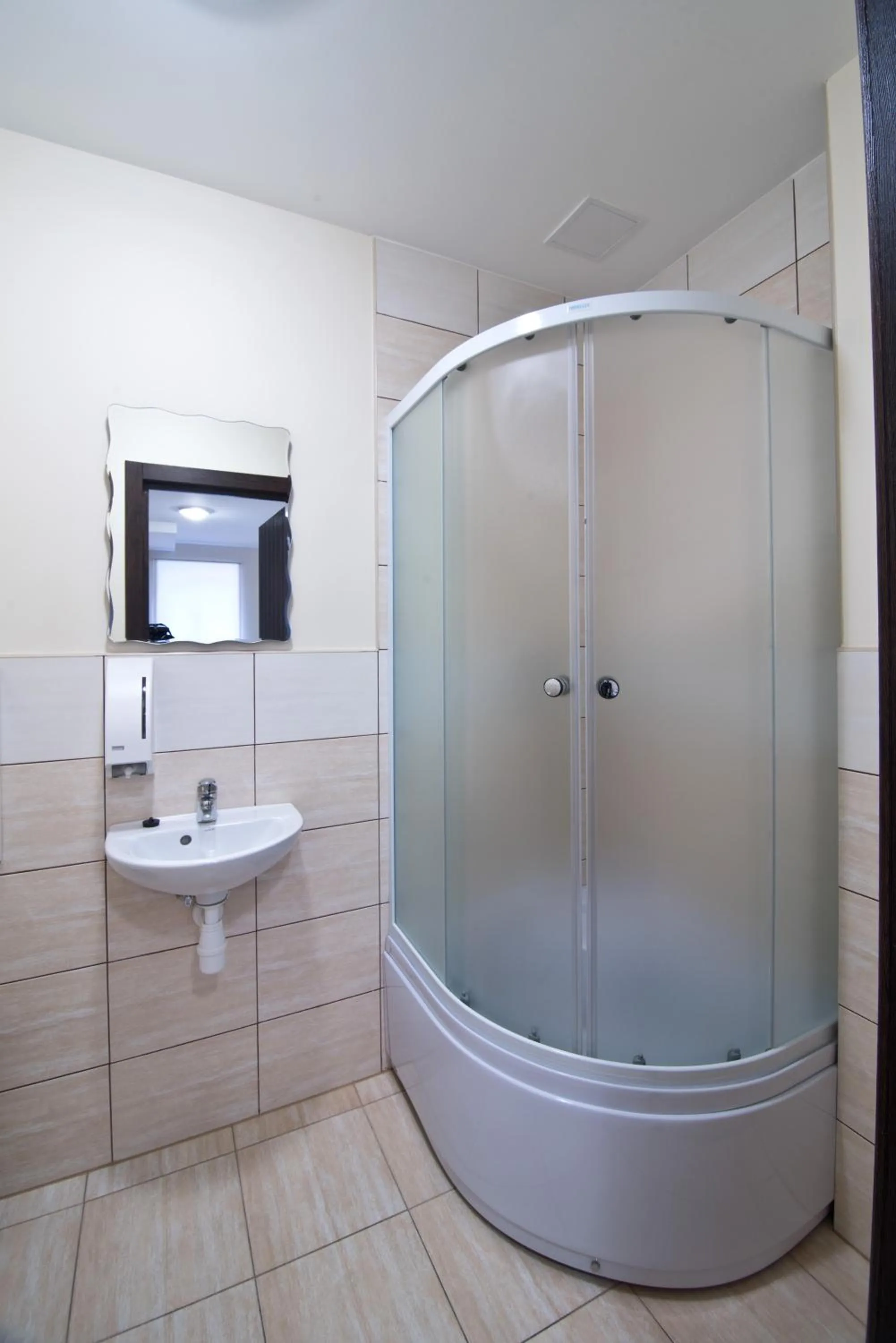 Shower in Bella Riga Hotel with Self-Check in