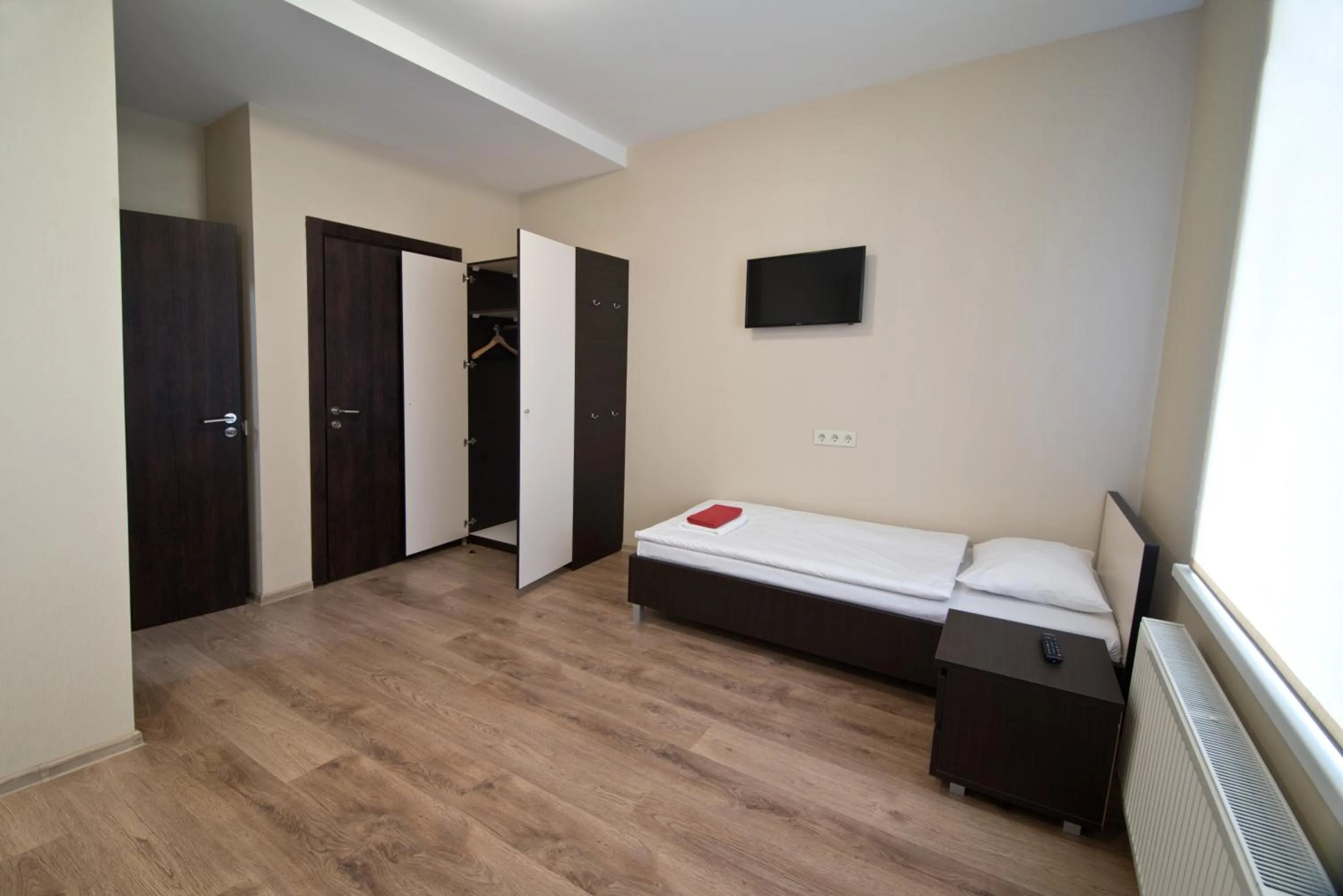 Bed in Bella Riga Hotel with Self-Check in