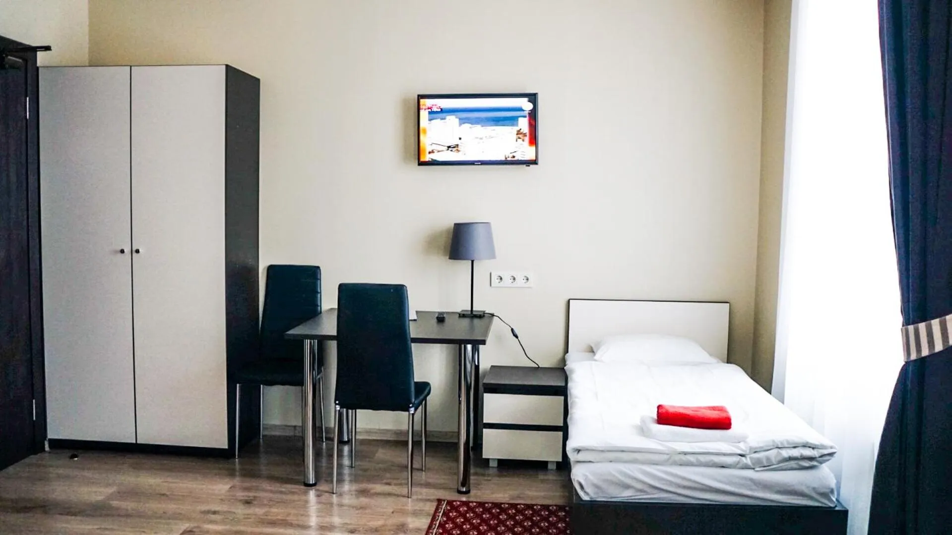 Bed in Bella Riga Hotel with Self-Check in