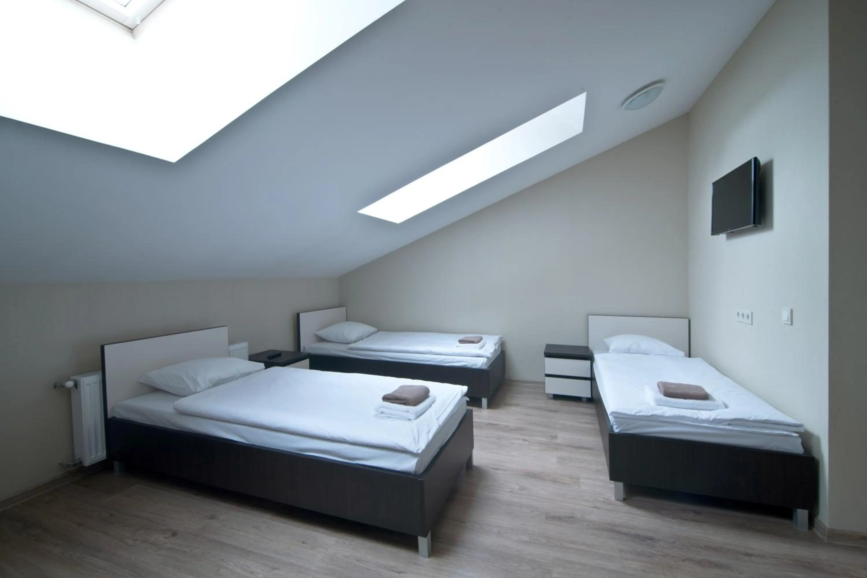 Bed in Bella Riga Hotel with Self-Check in