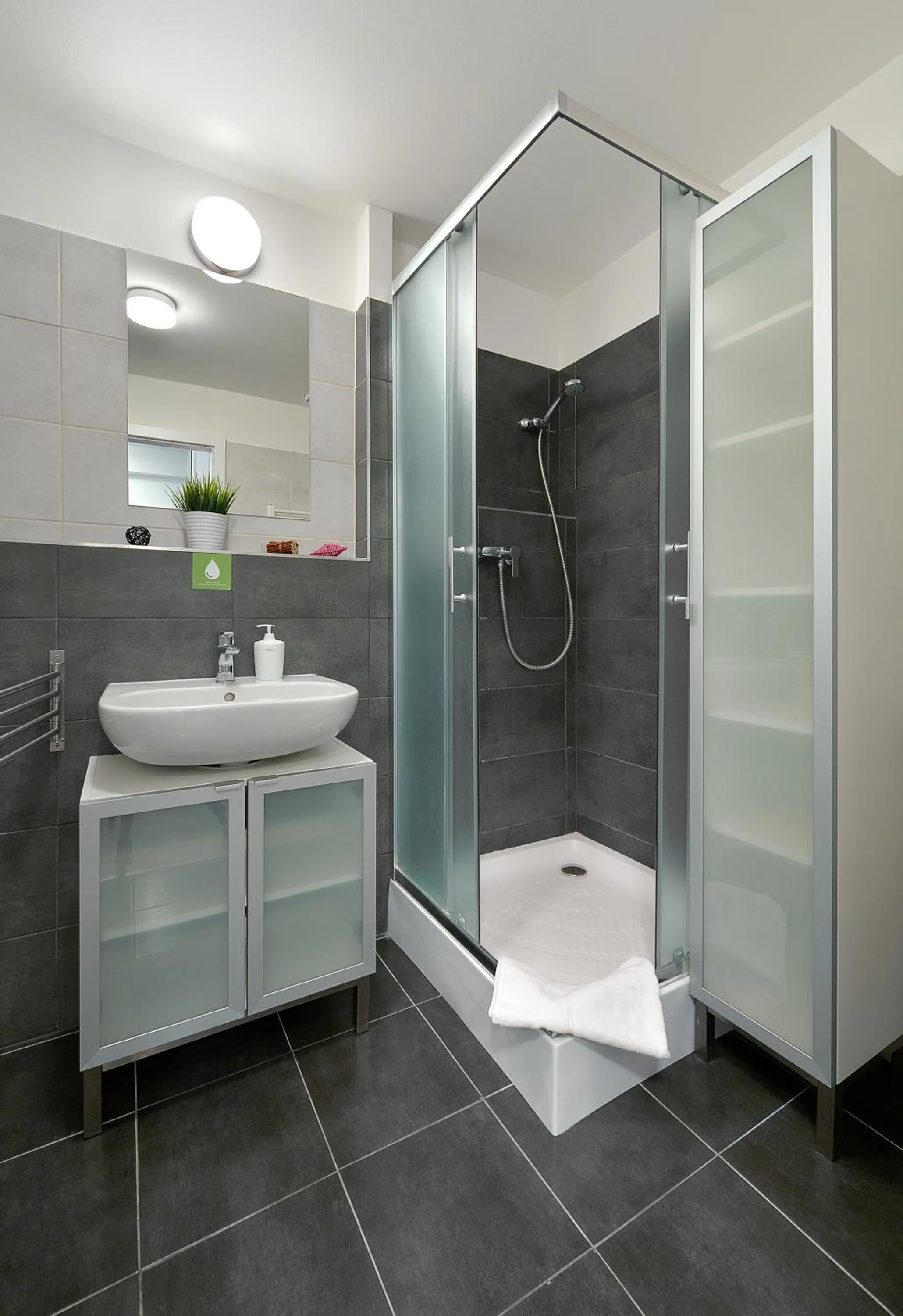 Bathroom in Charming & Cozy Ambiente Apartments