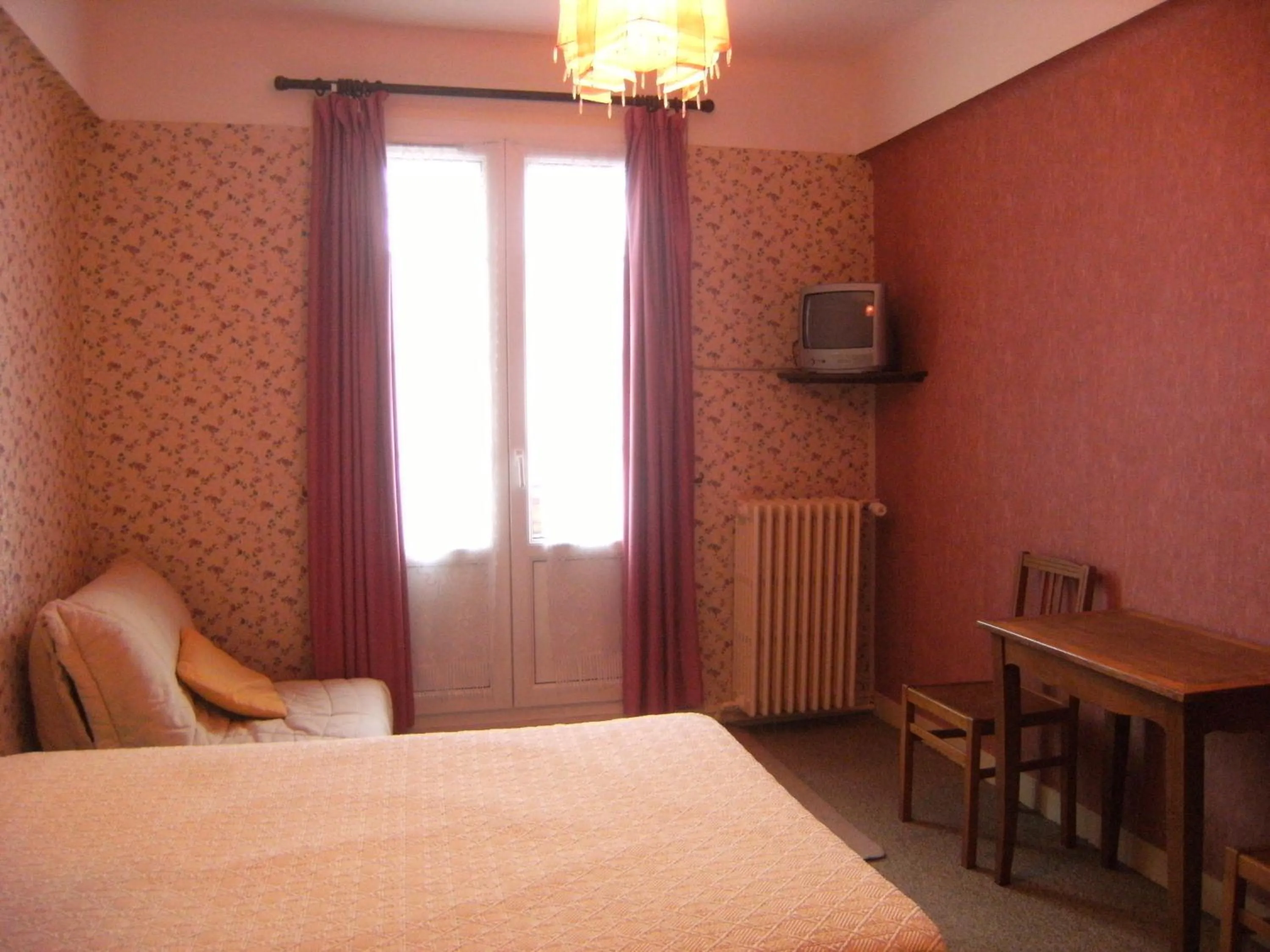 Photo of the whole room, Bed in Le Soleil D'or