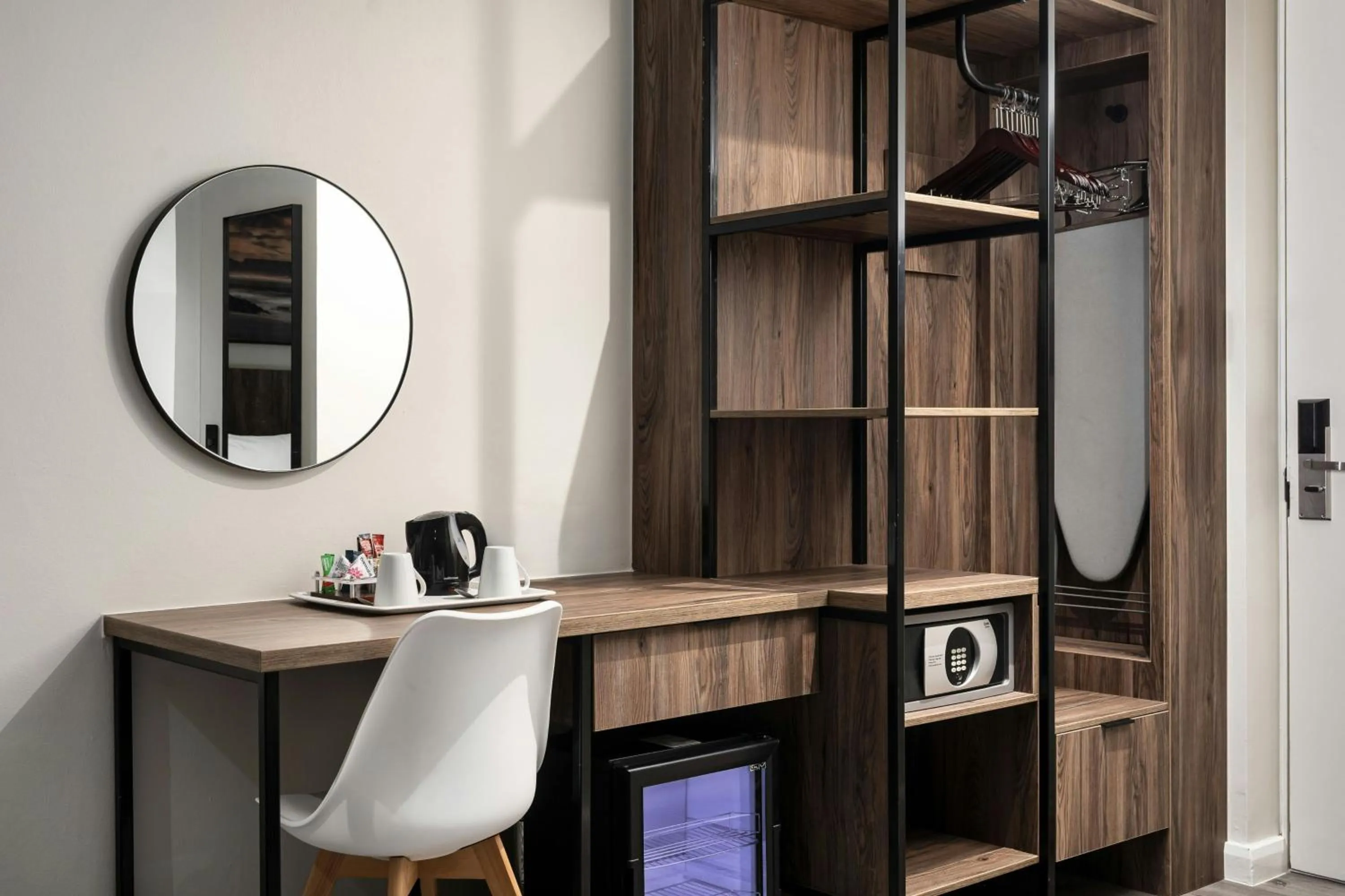 Photo of the whole room in Protea Hotel by Marriott Cape Town Waterfront Breakwater Lodge