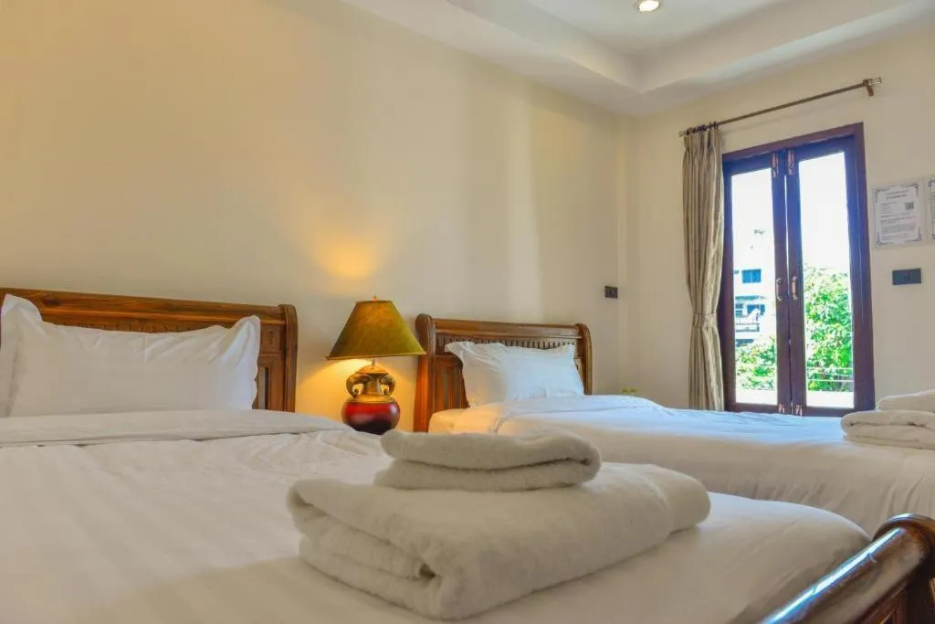 Bed in Yi's Garden Villa