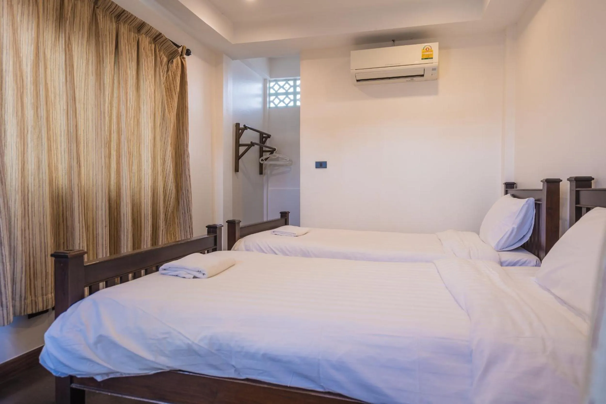 Bed in Yi's Garden Villa