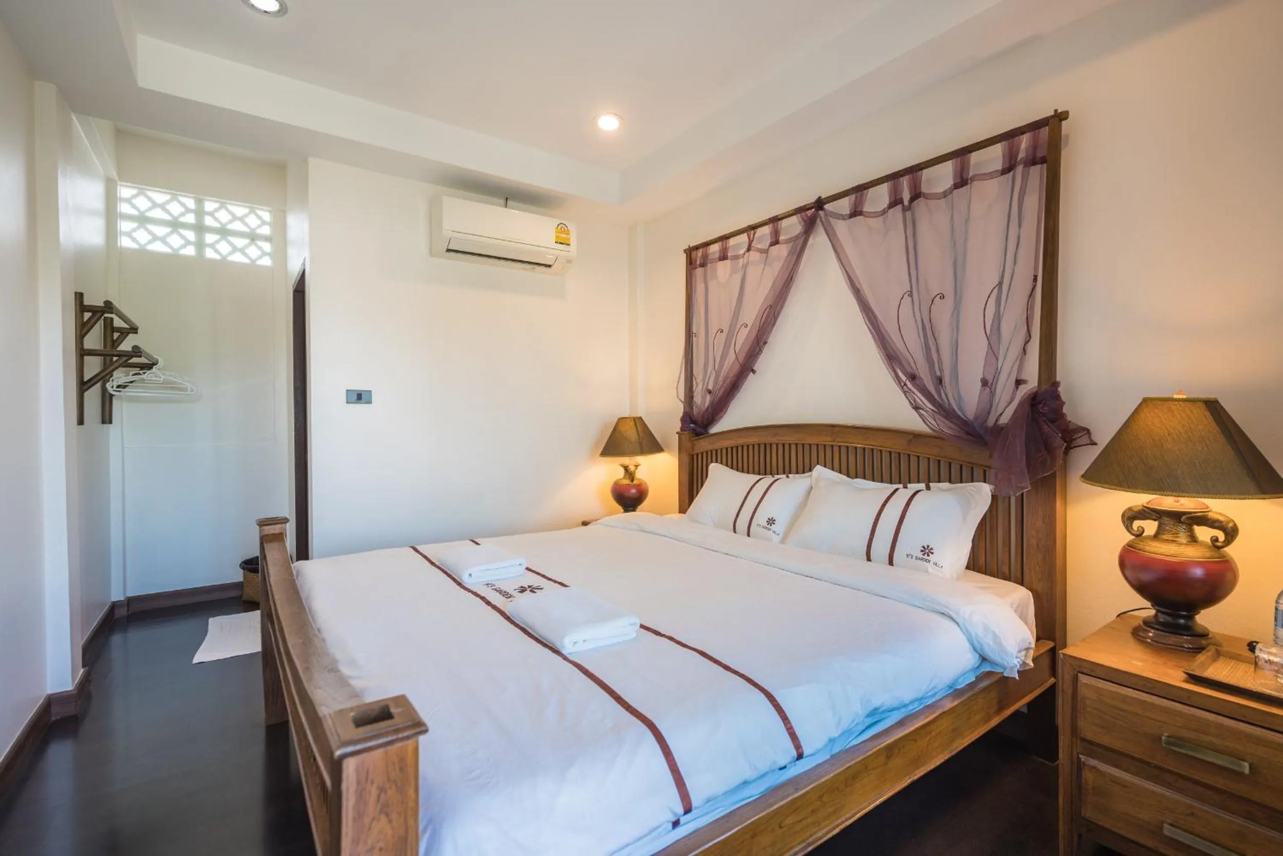 Bed in Yi's Garden Villa