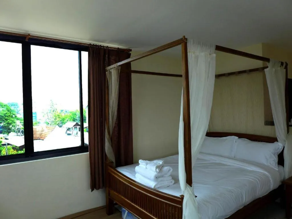 Bed in Yi's Garden Villa