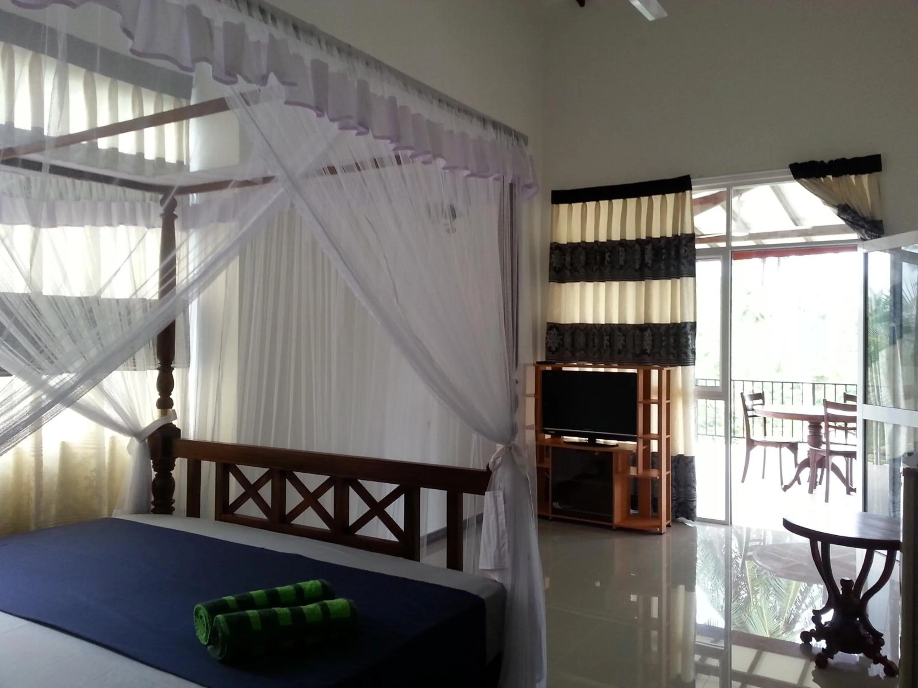 Photo of the whole room, Bed in Coral Palm Villa and Apartment
