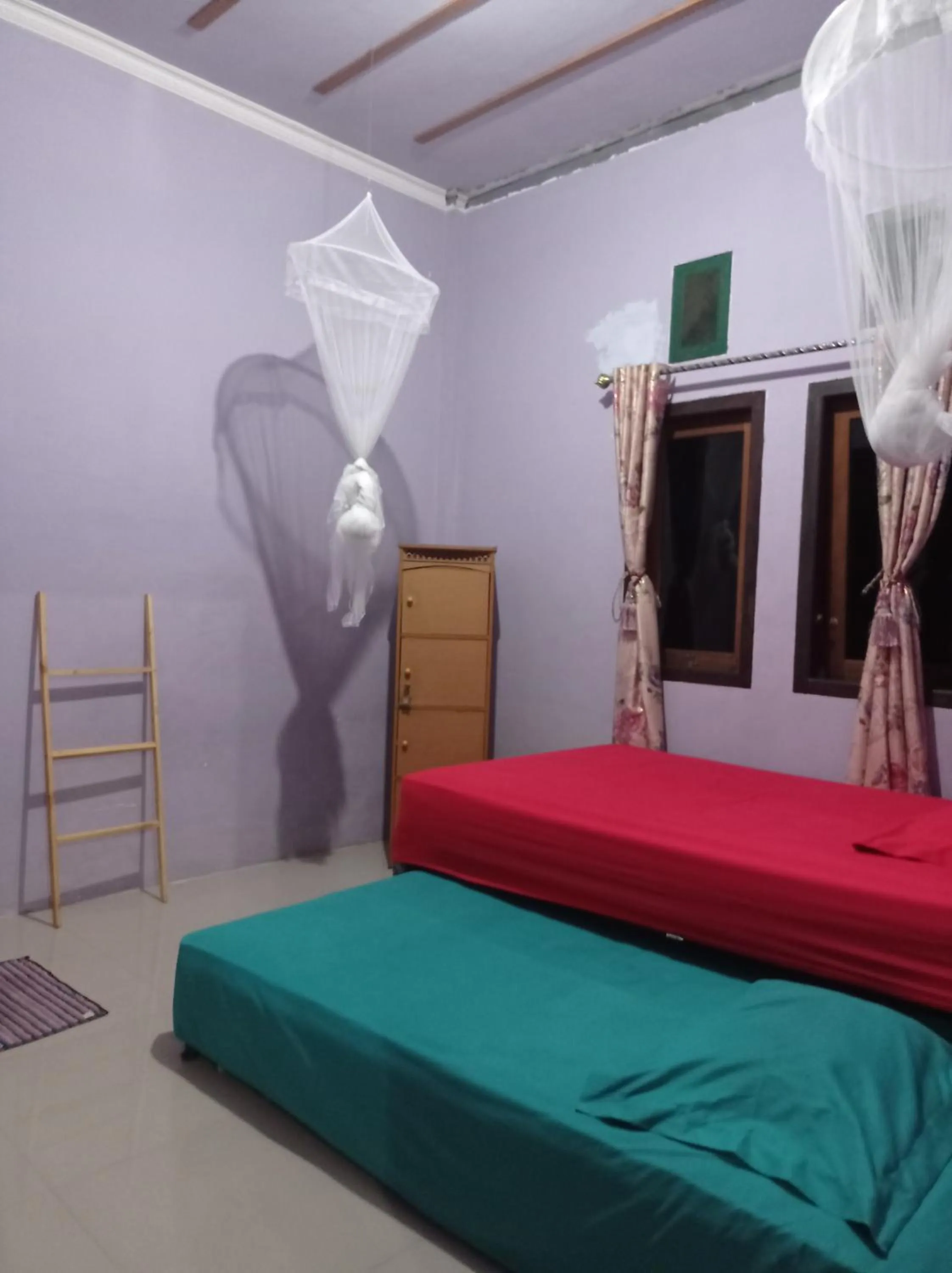 Bed in Kurnia Homestay