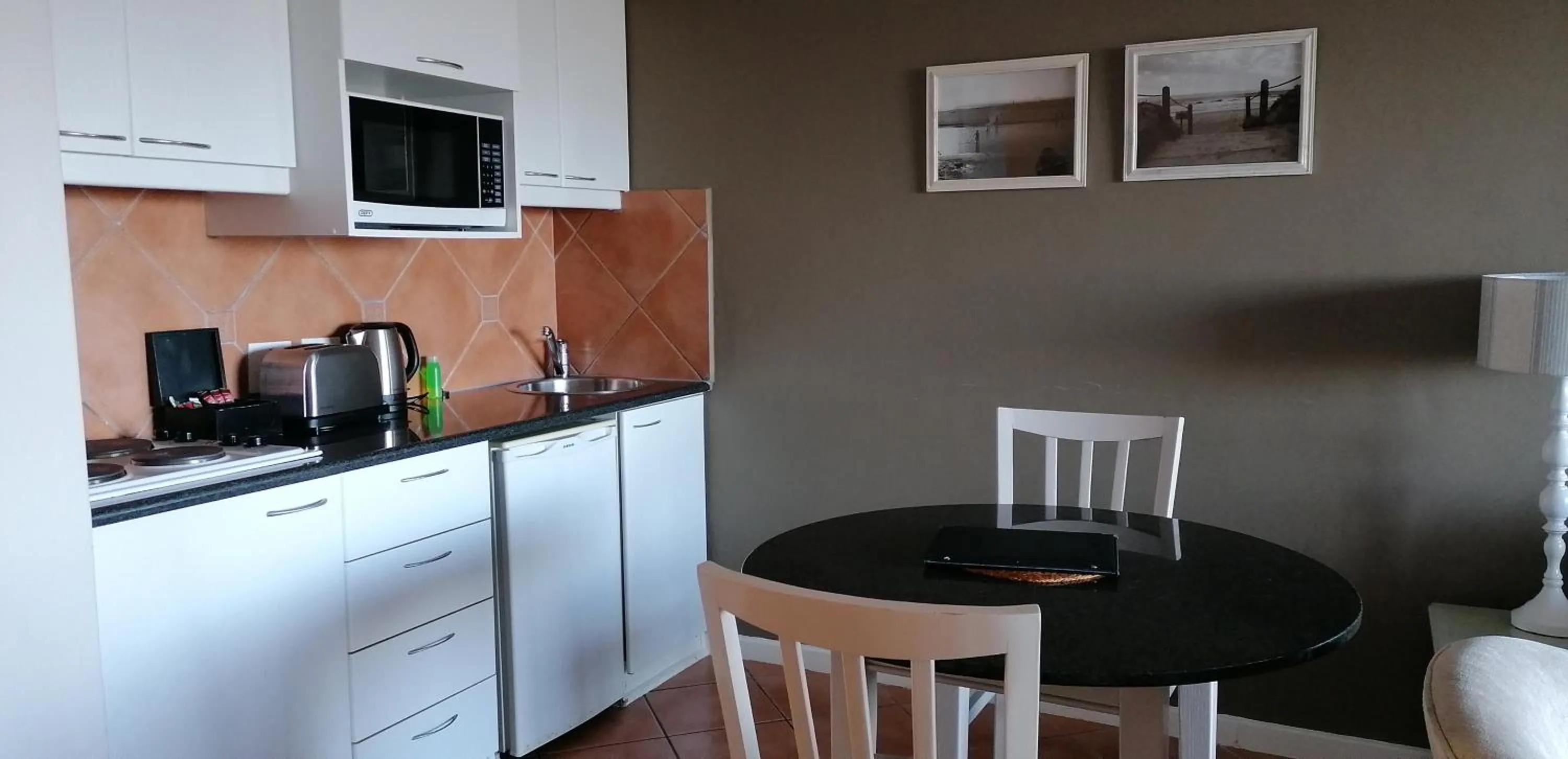 Kitchen or kitchenette in Cape Town Beachfront Apartments at Leisure Bay