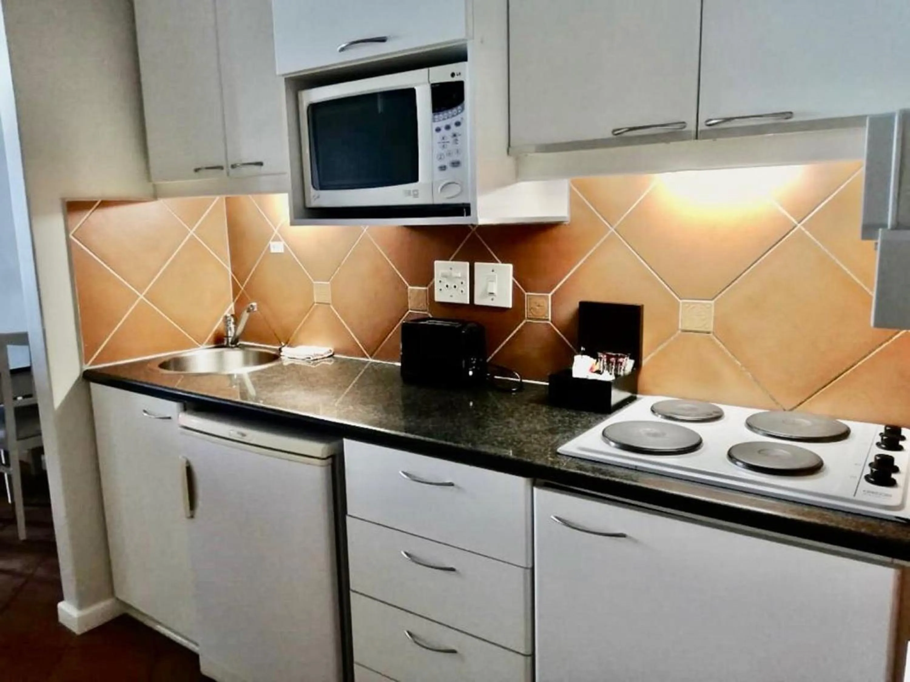 Kitchen or kitchenette in Cape Town Beachfront Apartments at Leisure Bay