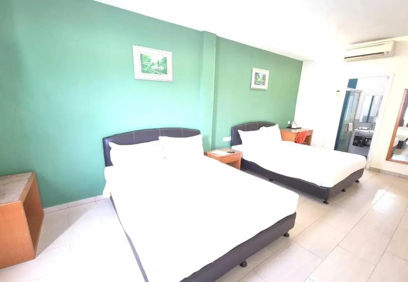 Family Room in Hotel Grand Court Inn Family Room in Hotel Grand Court Inn