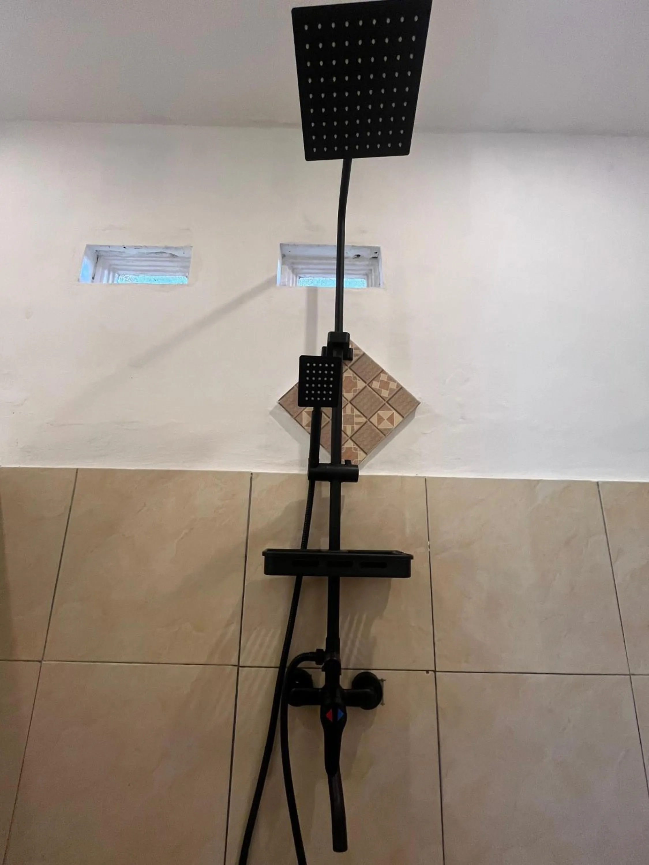 Shower in Roby Homestay
