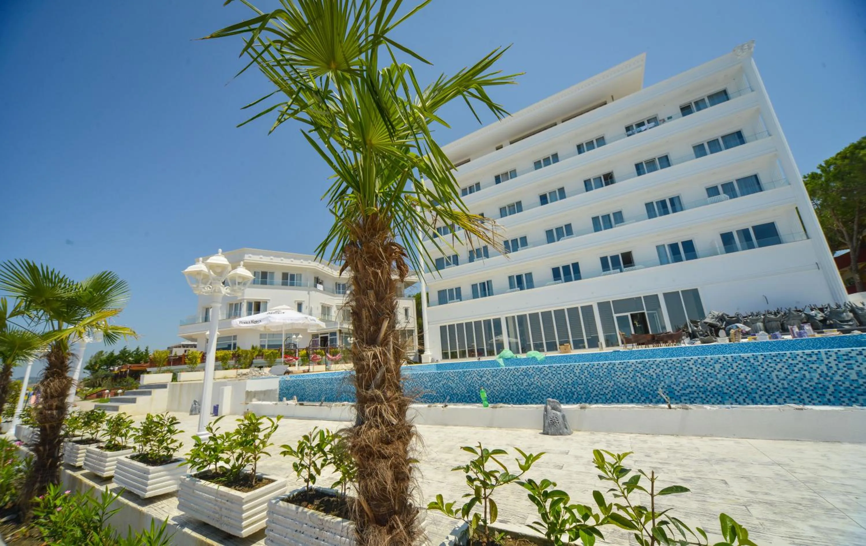 Property logo or sign in Hotel Elesio