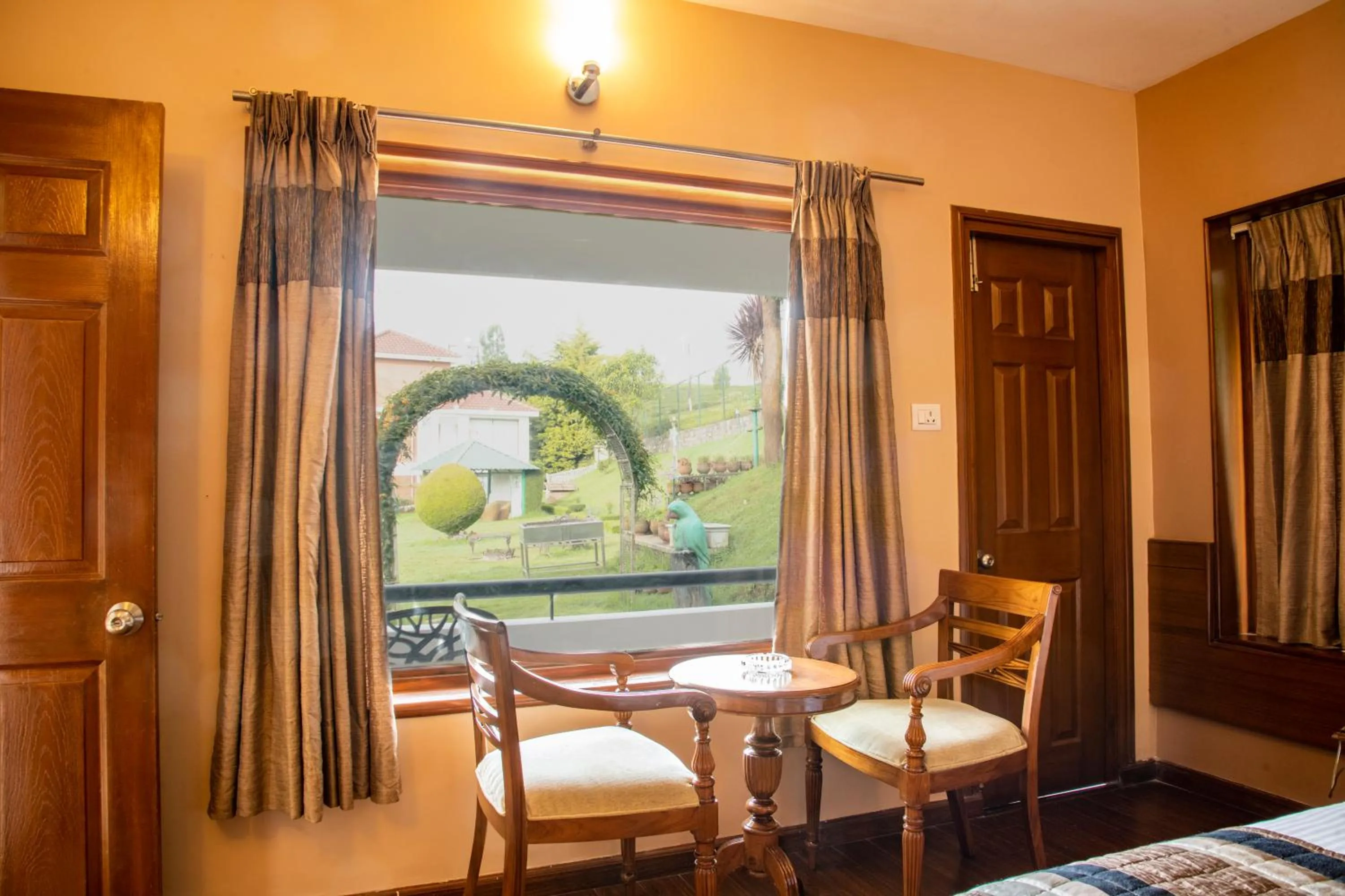 Seating area, Bed in Western Valley Resorts Ooty