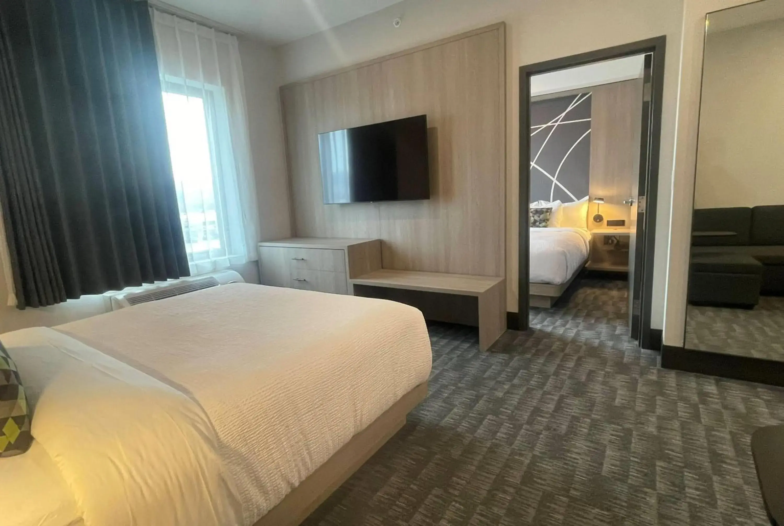 One-Bedroom Family Suite with One King Bed, One Queen Bed and Sofa Bed - Non-Smoking in La Quinta Inn & Suites by Wyndham Kelowna BC One-Bedroom Family Suite with One King Bed, One Queen Bed and Sofa Bed - Non-Smoking in La Quinta Inn & Suites by Wyndham Kelowna BC
