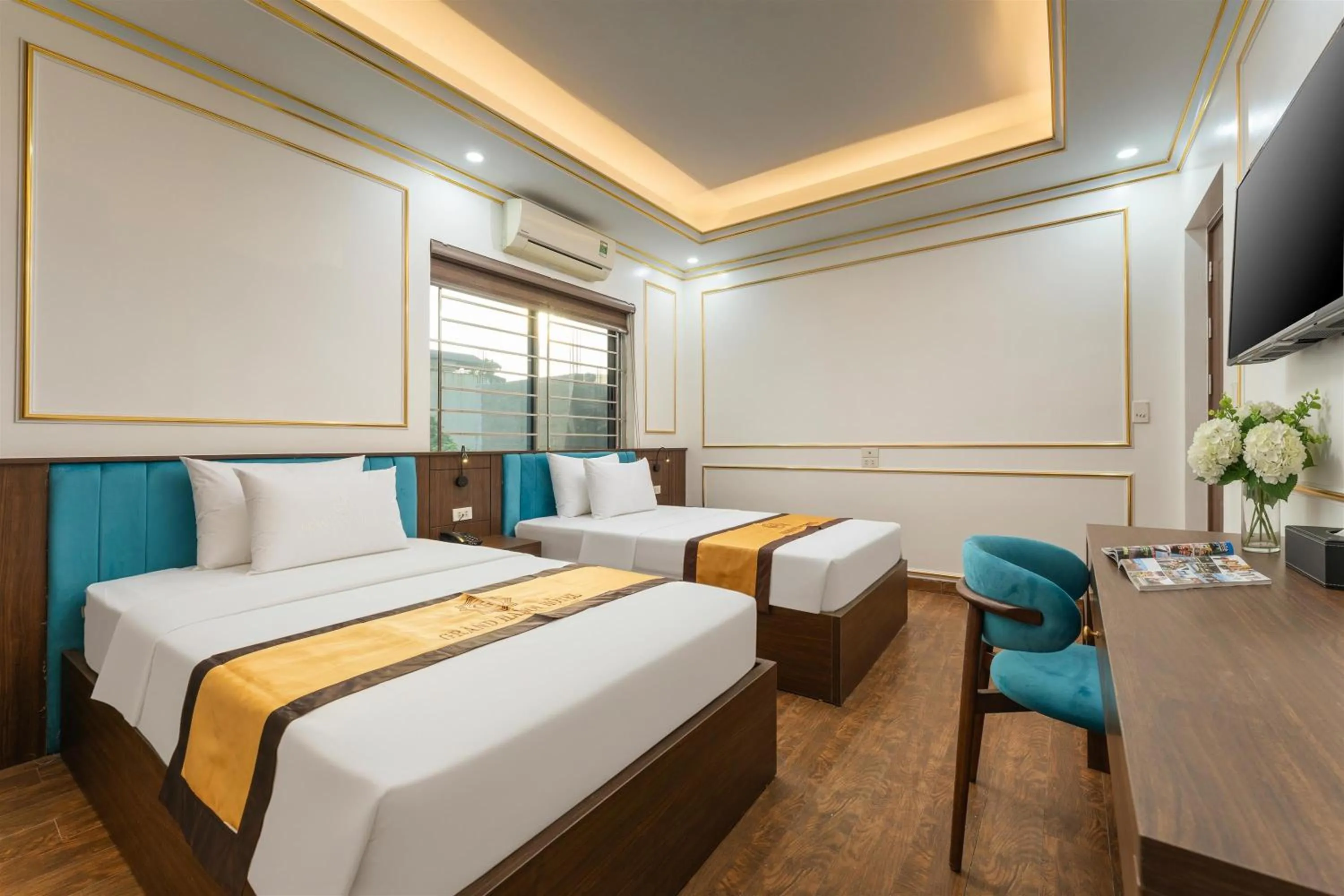 Bed in Grand Hanoi Boutique Hotel
