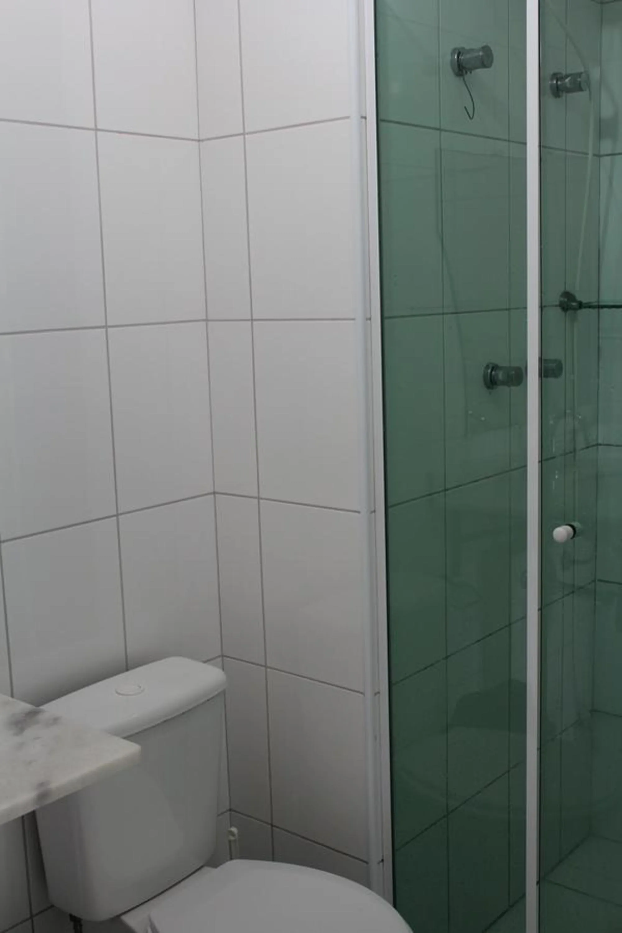 Toilet in Apto Vista Mar Com Lazer Total