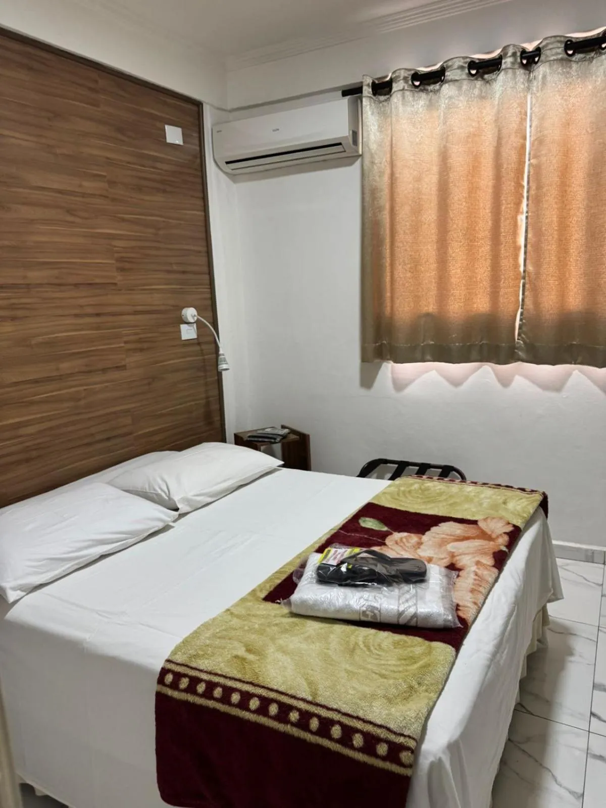 Bed in New Point Hotel