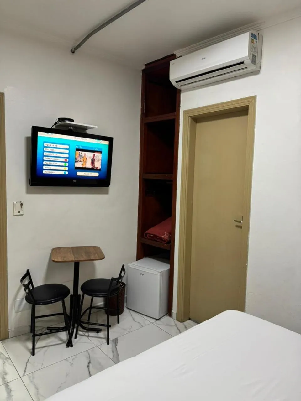 Bed in New Point Hotel