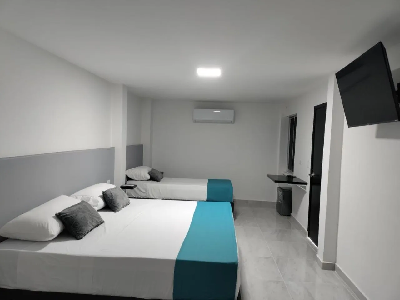 Photo of the whole room, Bed in Don David Sabana Hotel