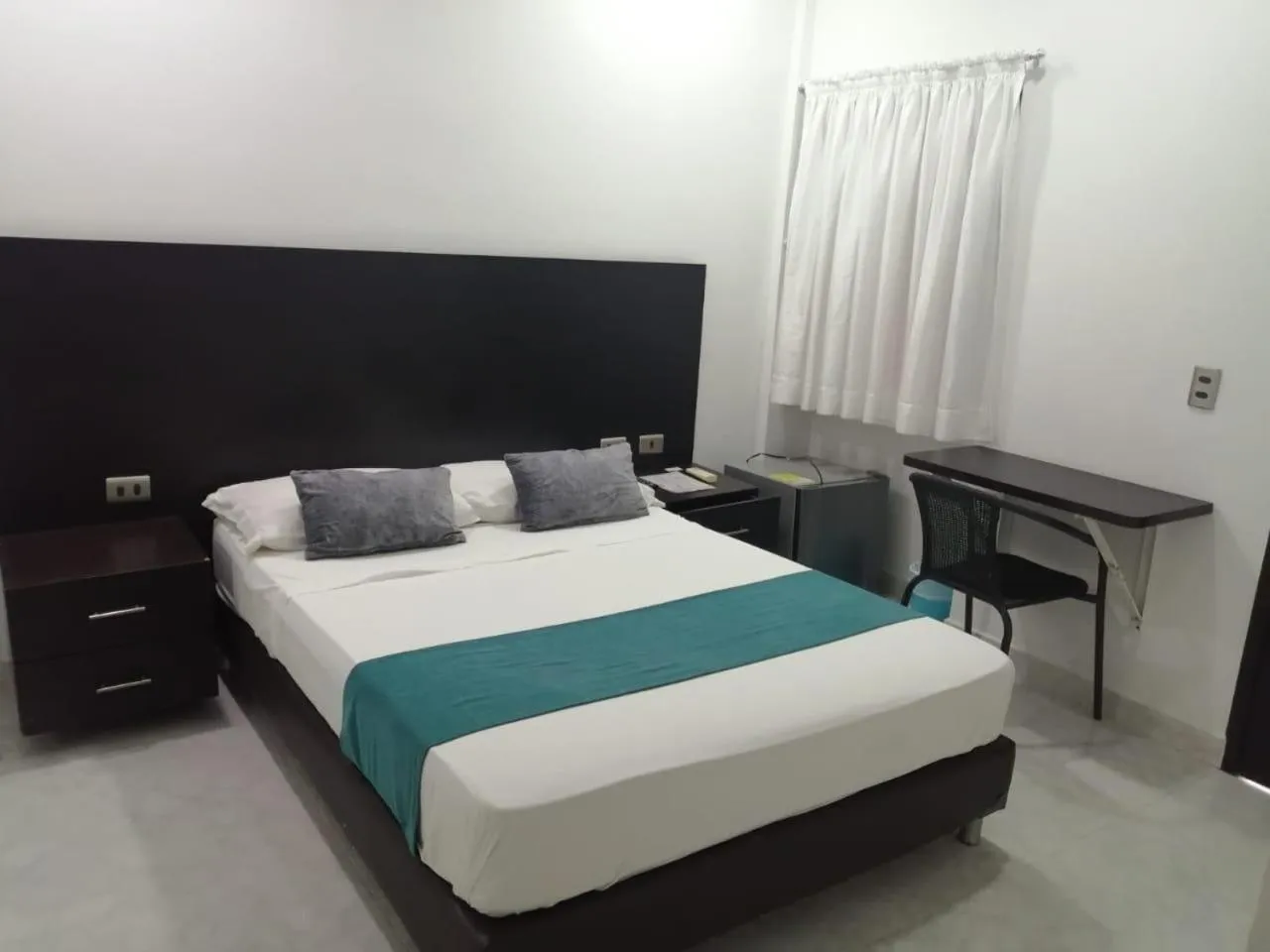 Photo of the whole room, Bed in Don David Sabana Hotel