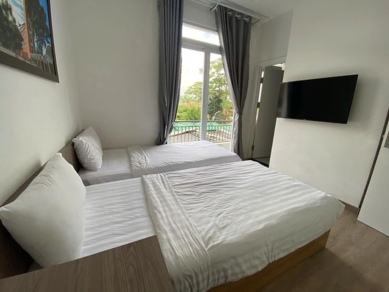 Bed in Ami Hotel Dalat