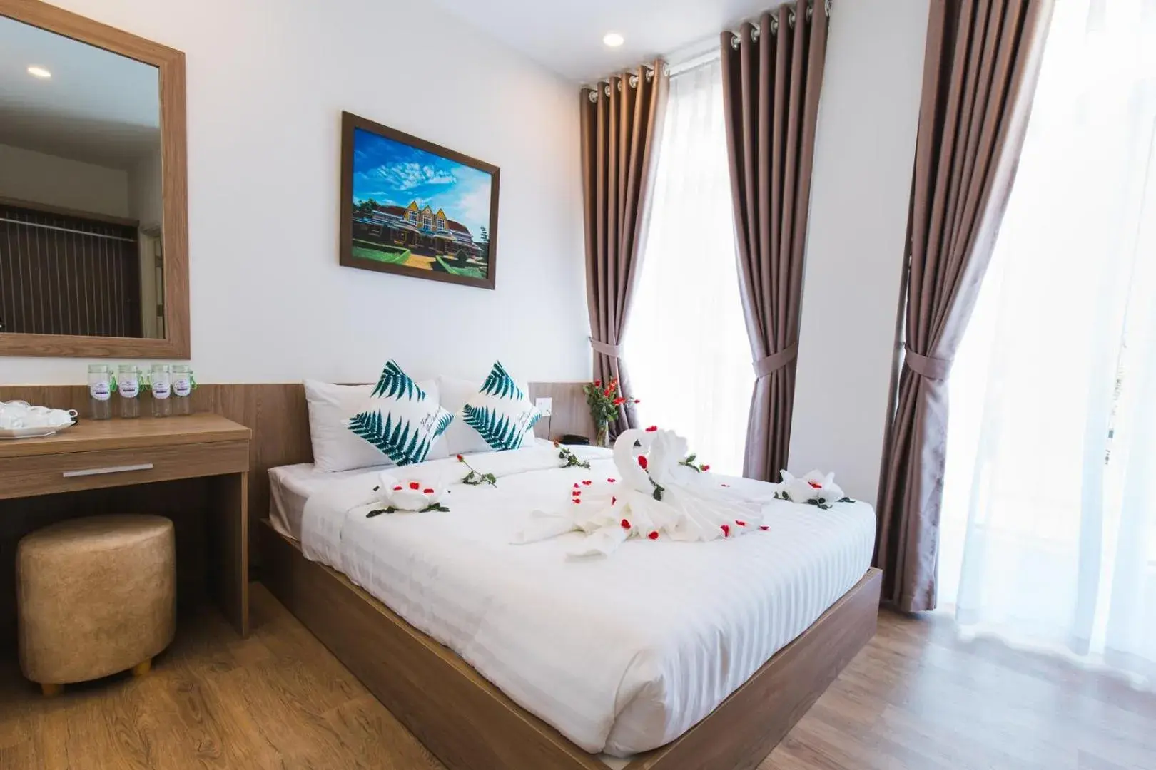 Deluxe Double or Twin Room with Balcony in Ami Hotel Dalat Deluxe Double or Twin Room with Balcony in Ami Hotel Dalat