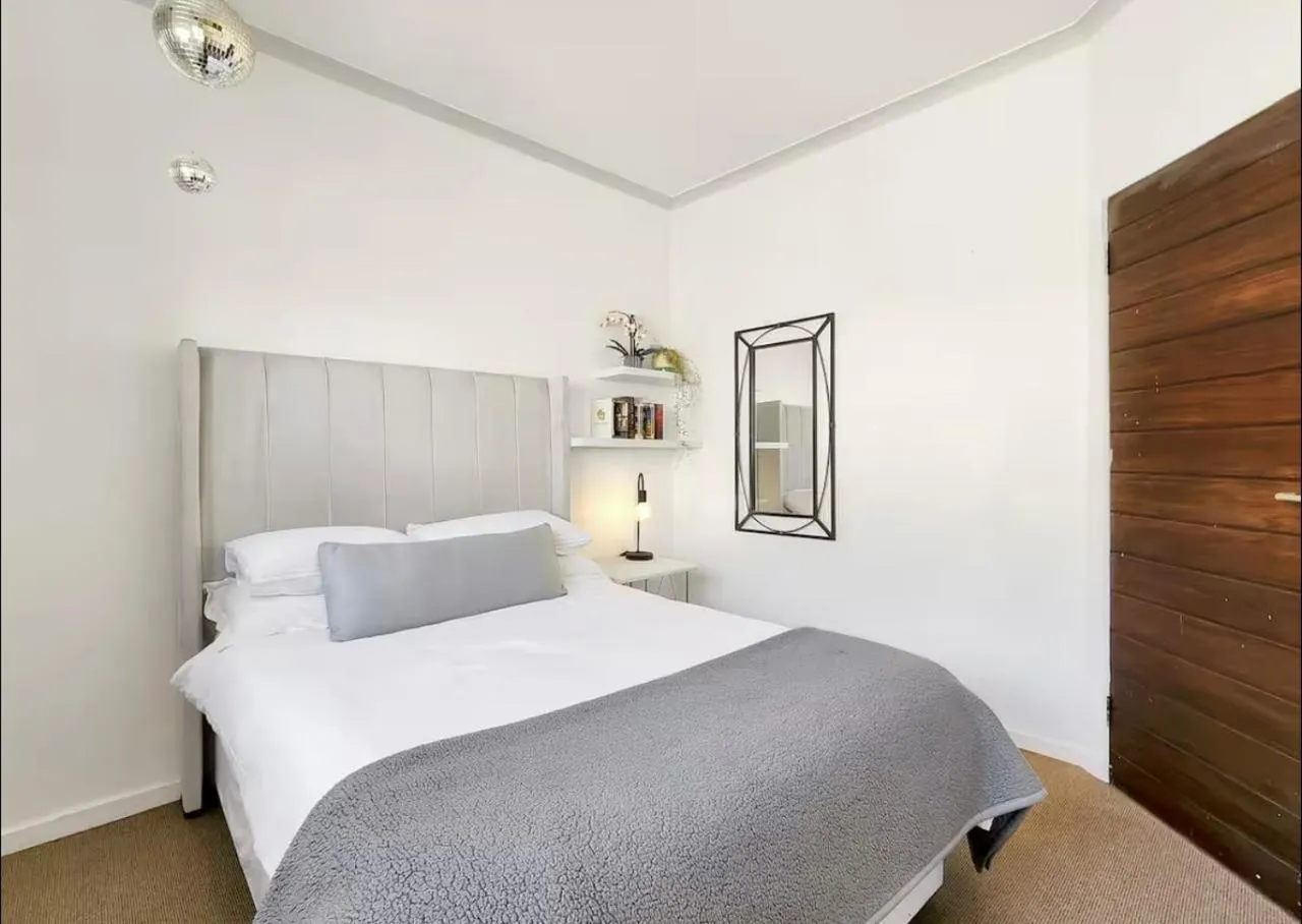 Bed in Sunset Bliss Villa, Sunset Beach, Cape Town