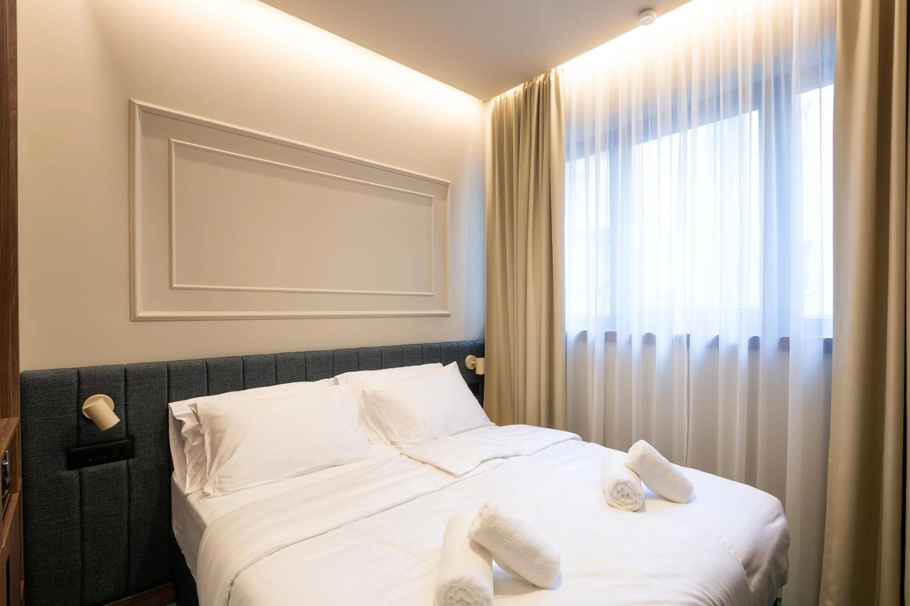 Bed in Boutique Hotel OPERA