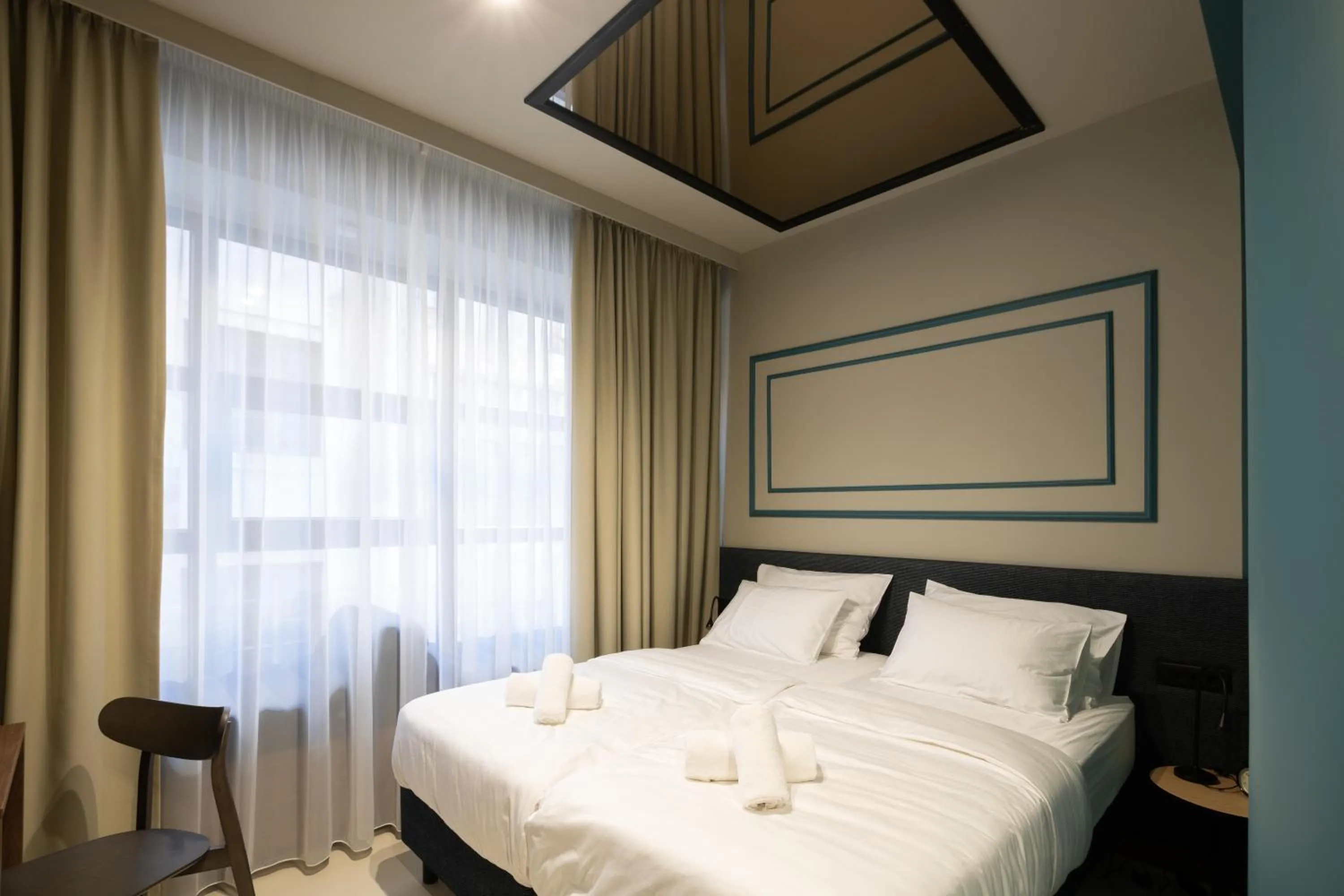 Bed in Boutique Hotel OPERA