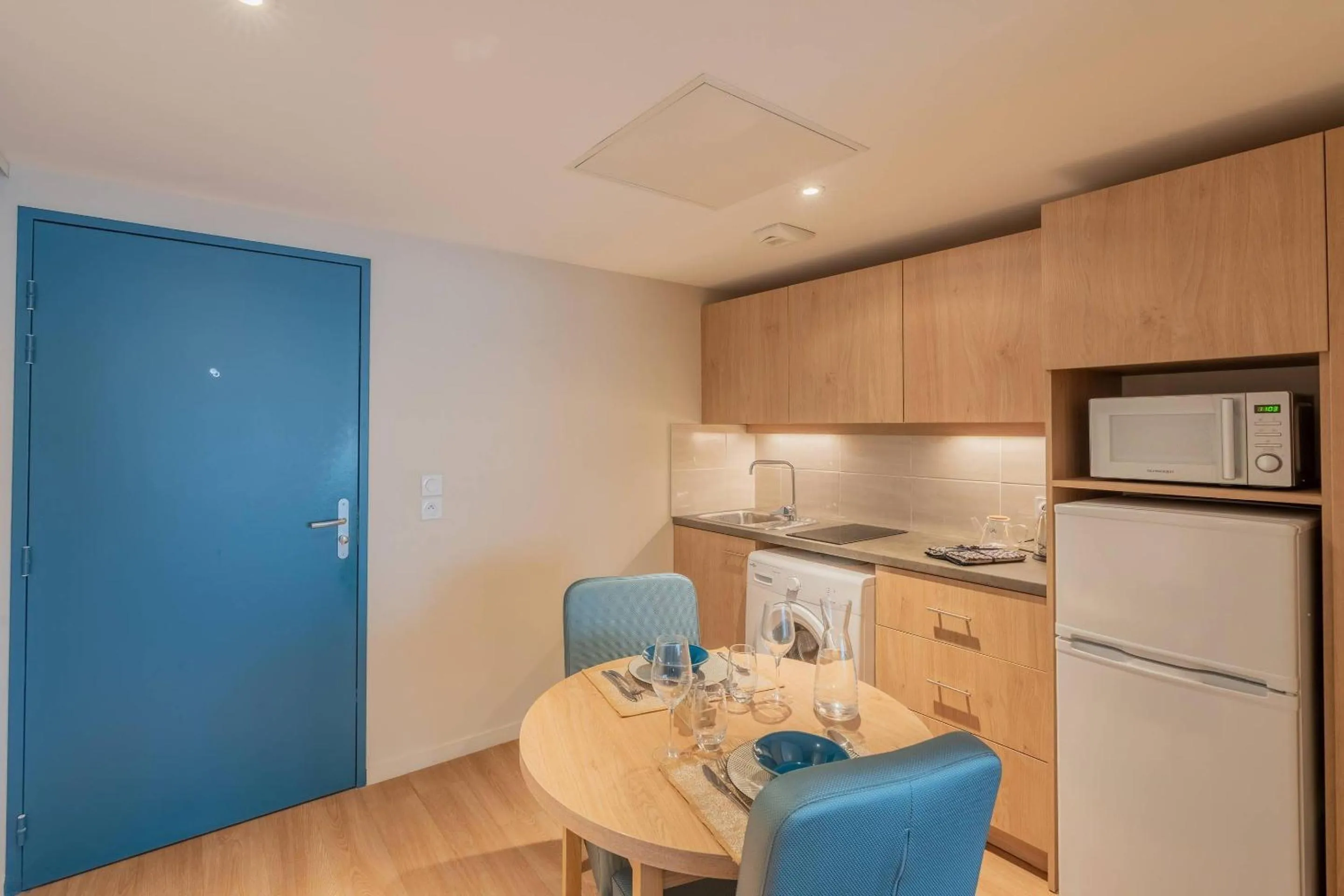 Kitchen or kitchenette in Quality Aparthotel Toulouse Ponts Jumeaux