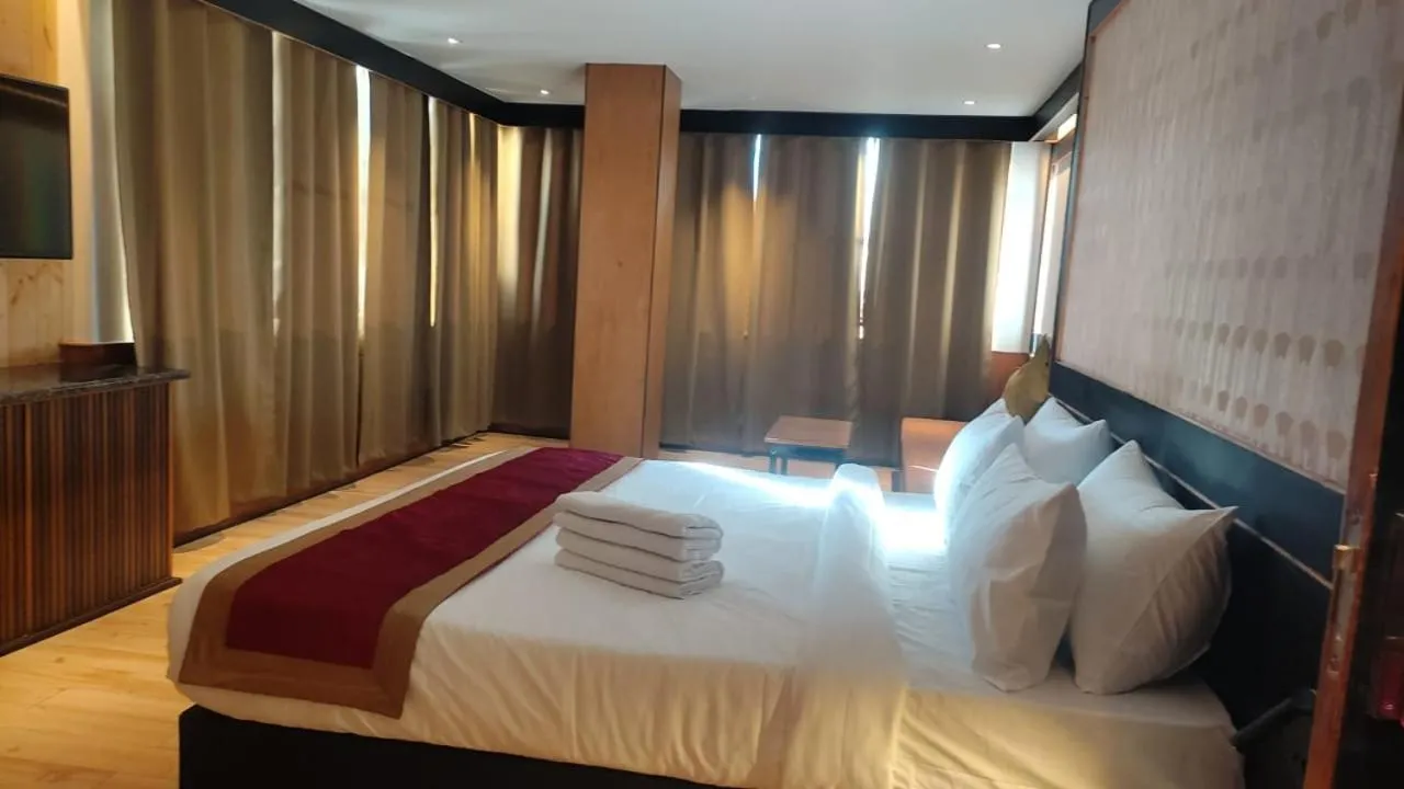 Bed in Hotel Mist Tree Mountain