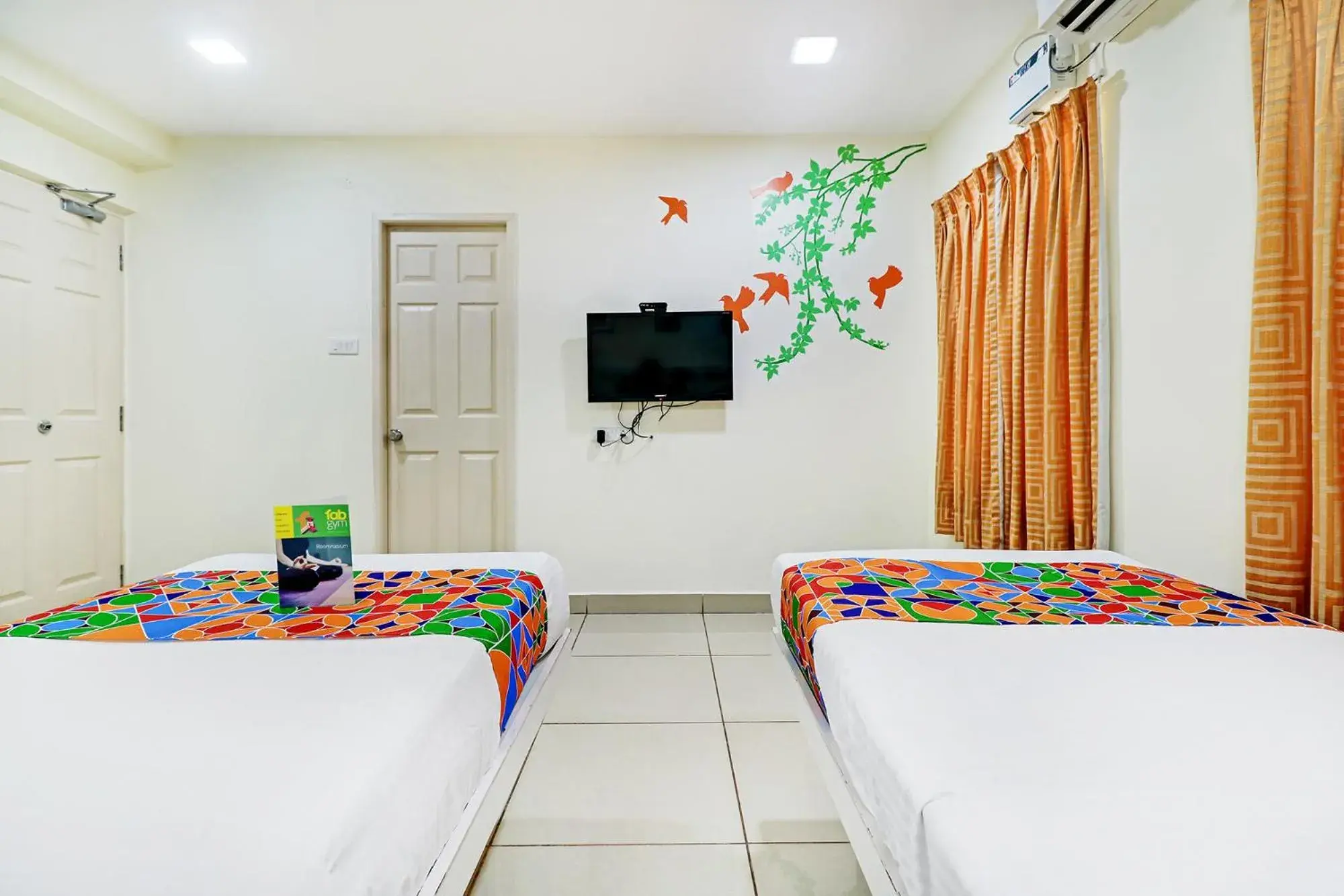 Bed in Fabhotel Colors Service Apartment - Nr MRC Nagar Bed in Fabhotel Colors Service Apartment - Nr MRC Nagar