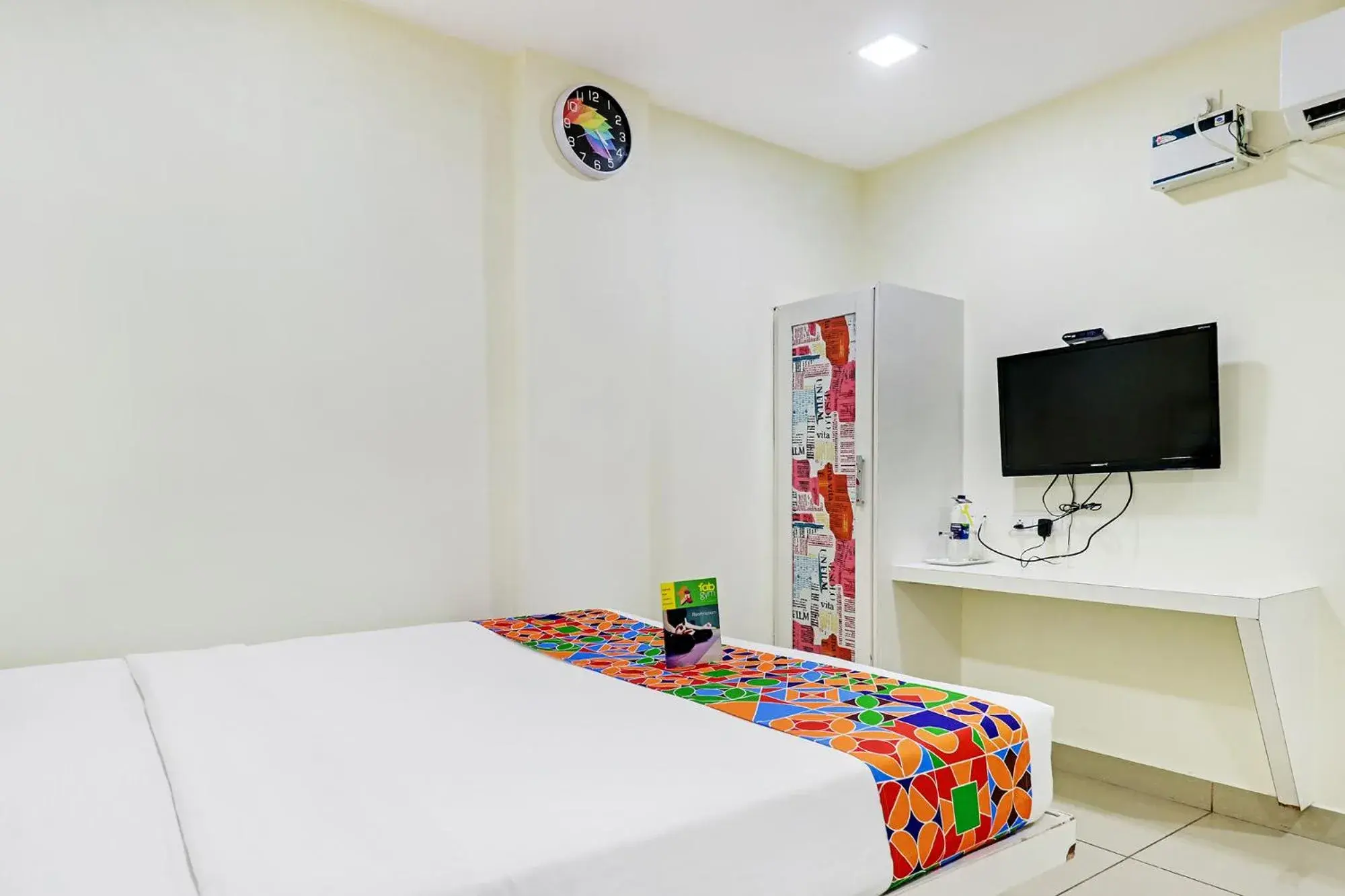 Bed in Fabhotel Colors Service Apartment - Nr MRC Nagar Bed in Fabhotel Colors Service Apartment - Nr MRC Nagar