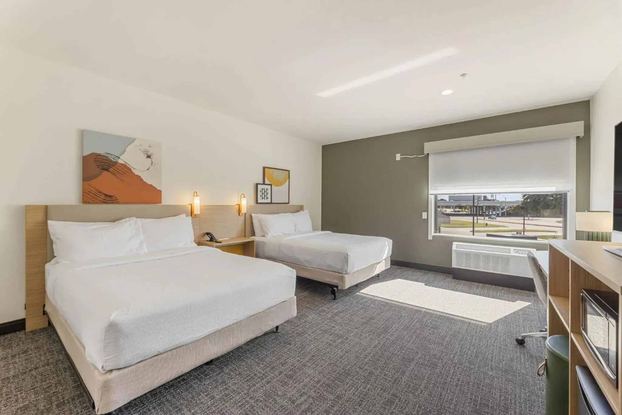 Room with Two Queen Beds and Bath Tub - Mobility and Hearing Accessible in Spark By Hilton Garland Dallas East Room with Two Queen Beds and Bath Tub - Mobility and Hearing Accessible in Spark By Hilton Garland Dallas East