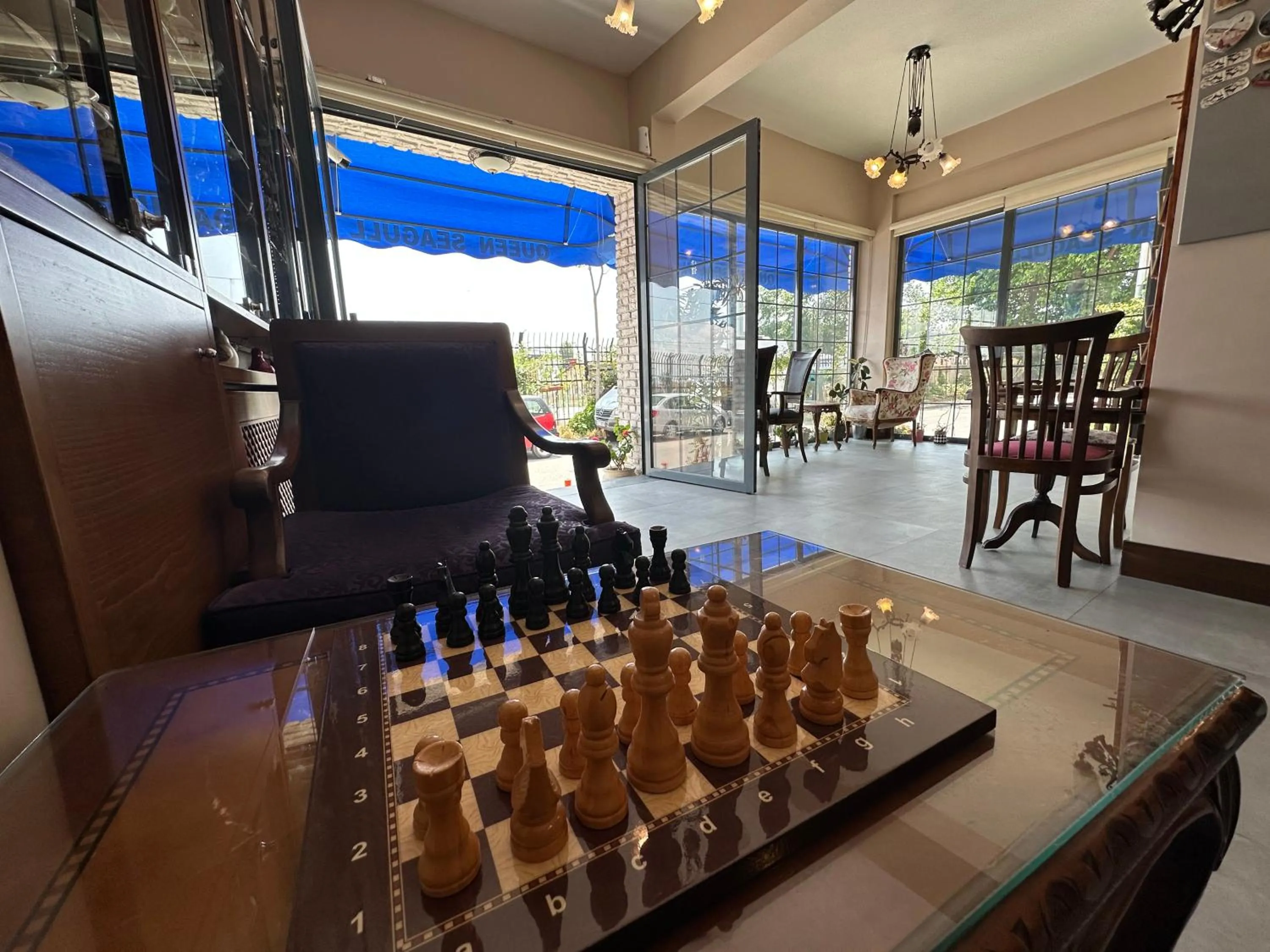 Communal lounge/ TV room in Queen Seagull Boutique Hotel