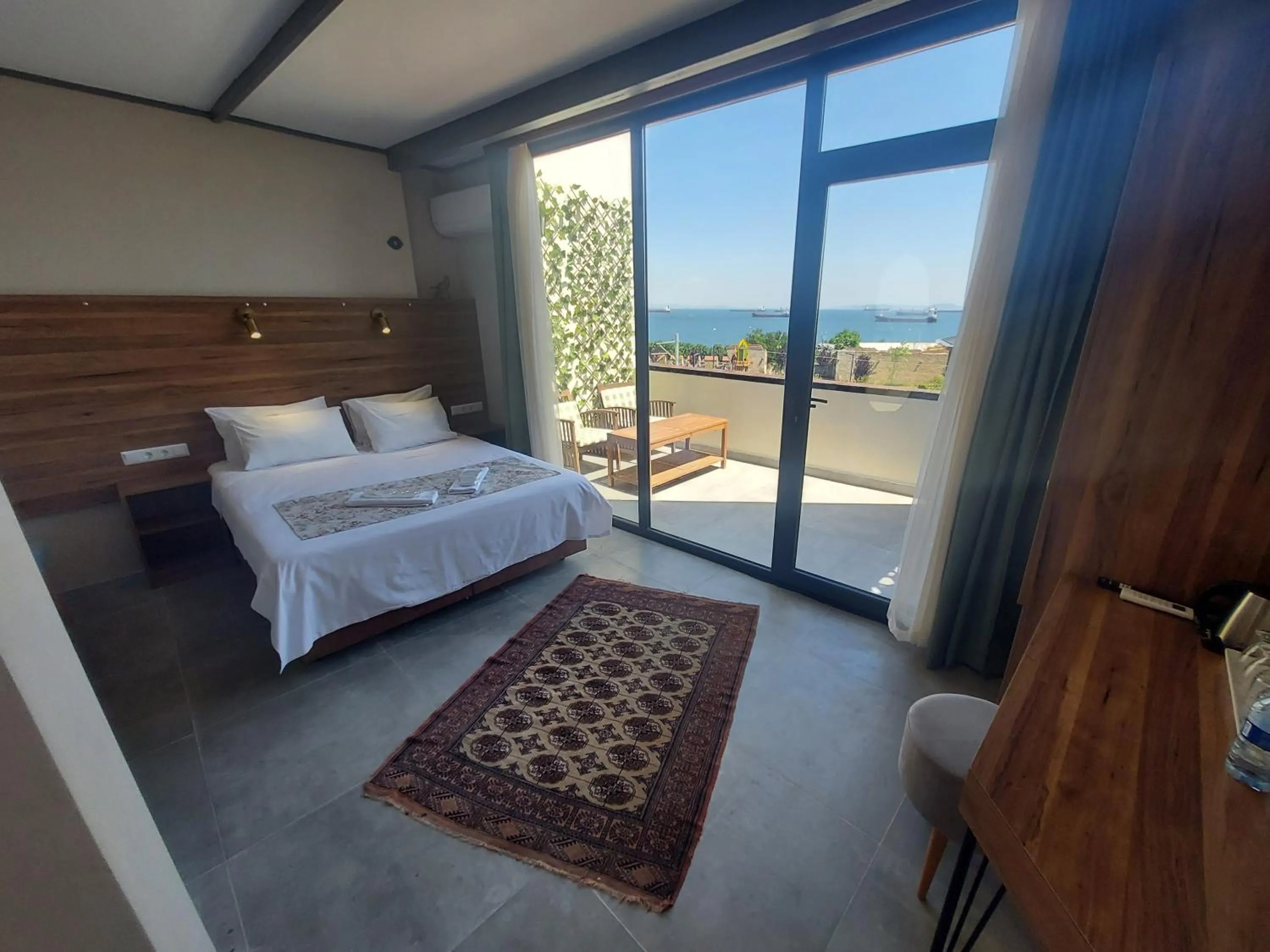 Bed in Queen Seagull Boutique Hotel