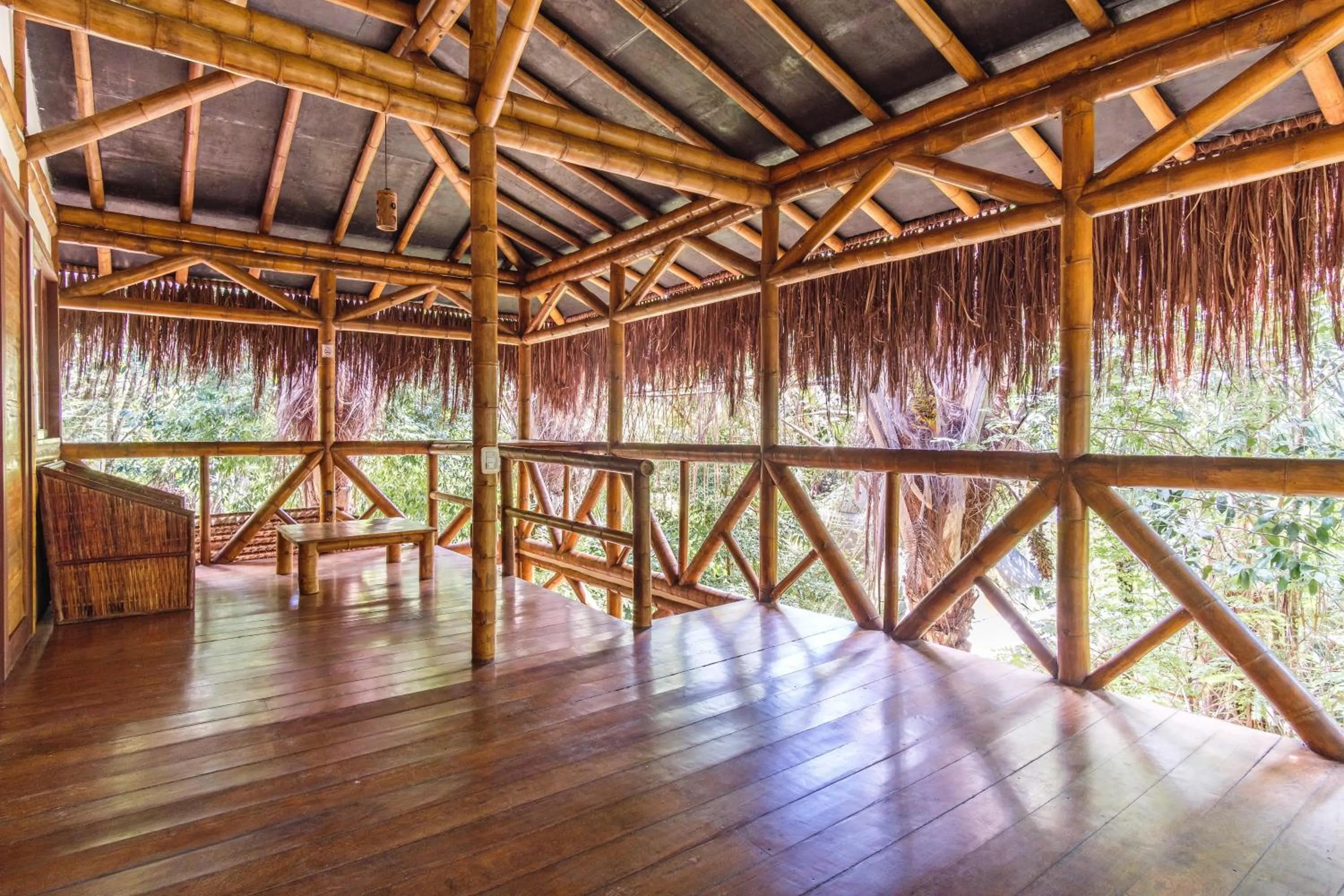 Communal lounge/ TV room in Universo Pol Bamboo Hostel