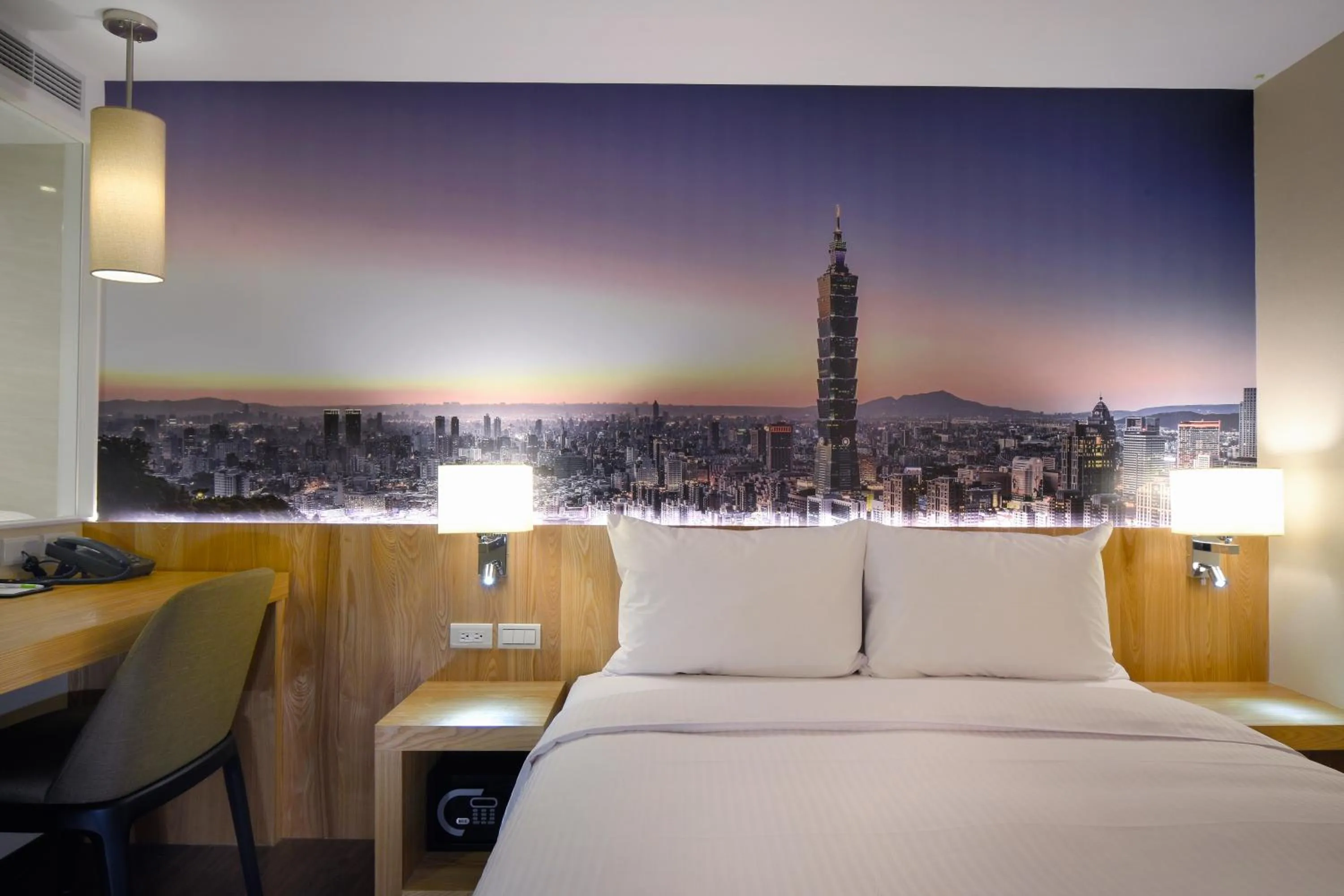 Bed in Eastin Taipei Hotel