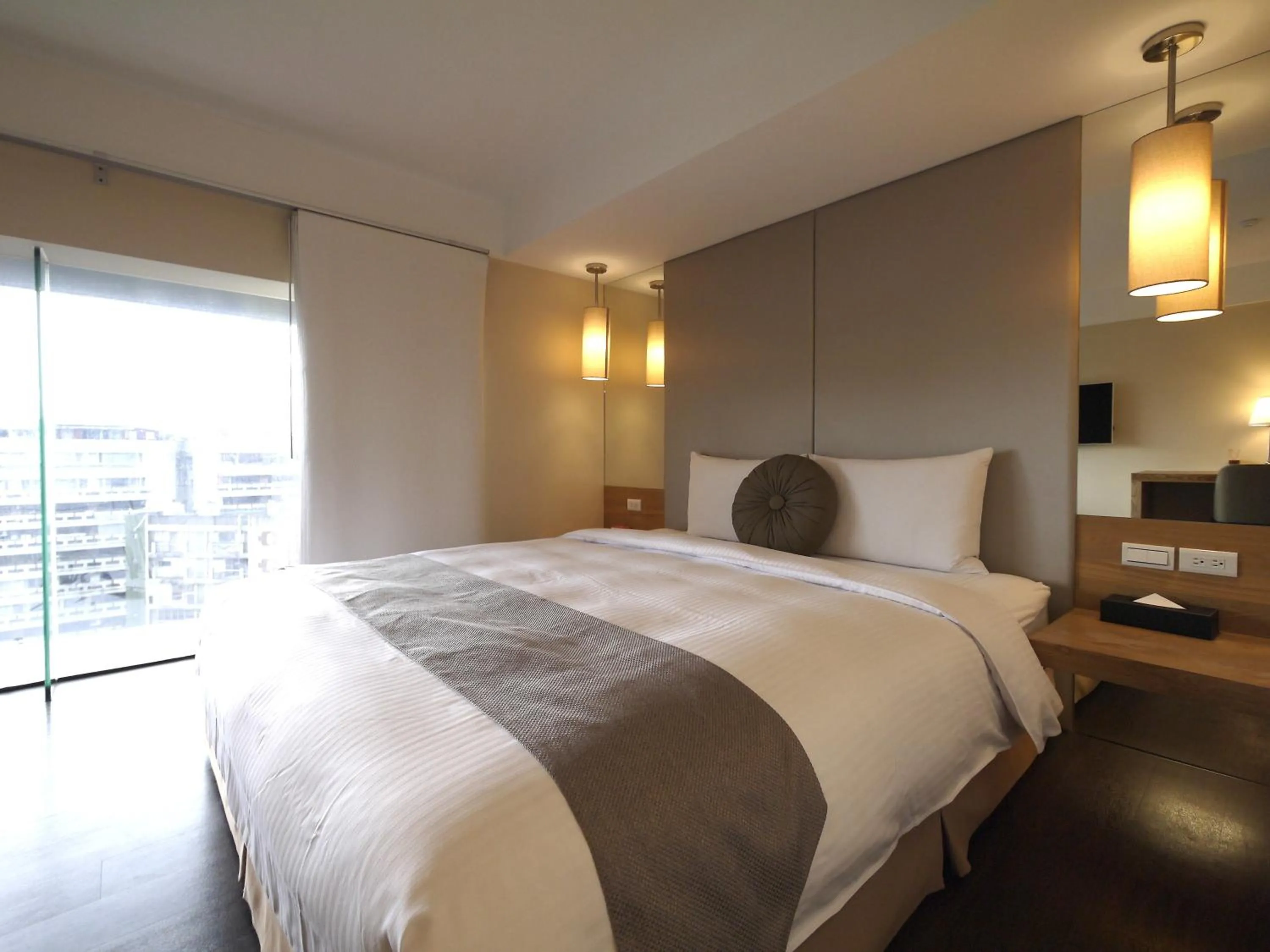 Bed in Eastin Taipei Hotel