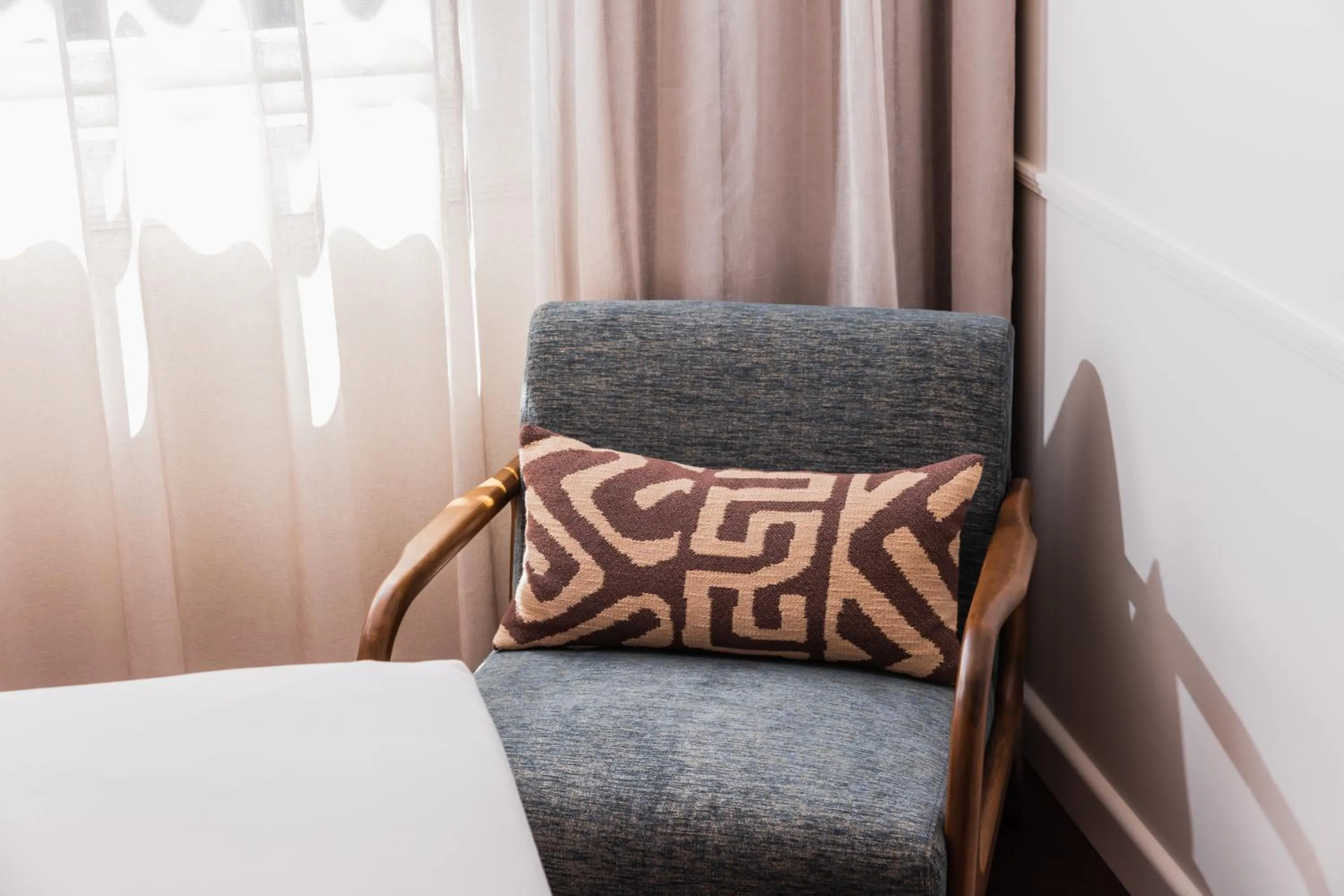 Bed in Kurrajong Hotel Sydney