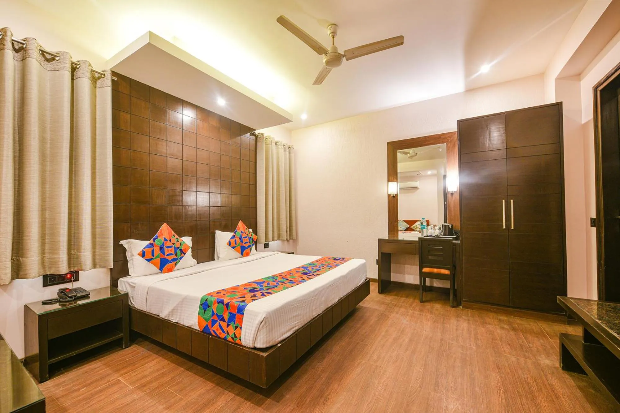Bed in FabHotel Aashraye