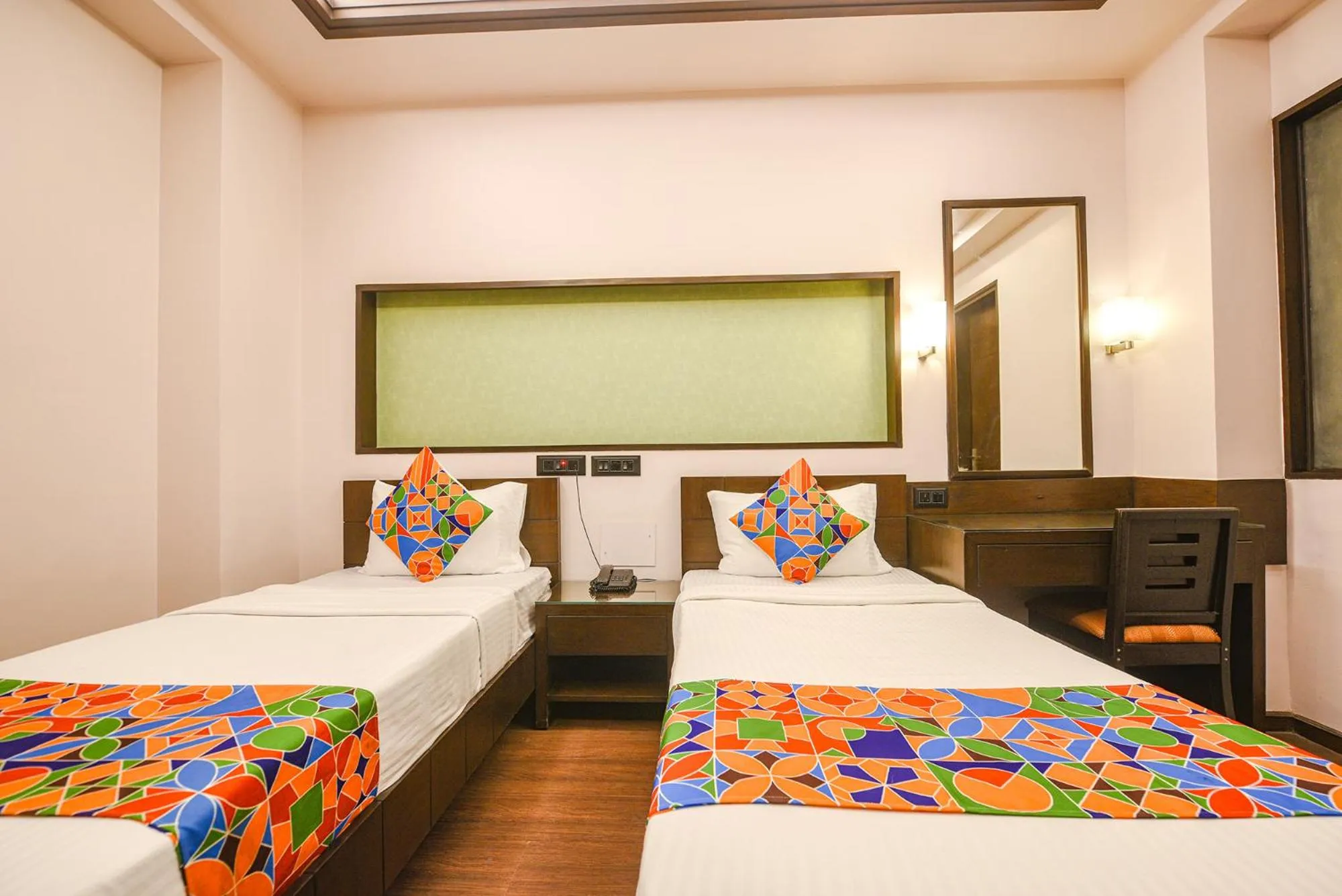 Bed in FabHotel Aashraye