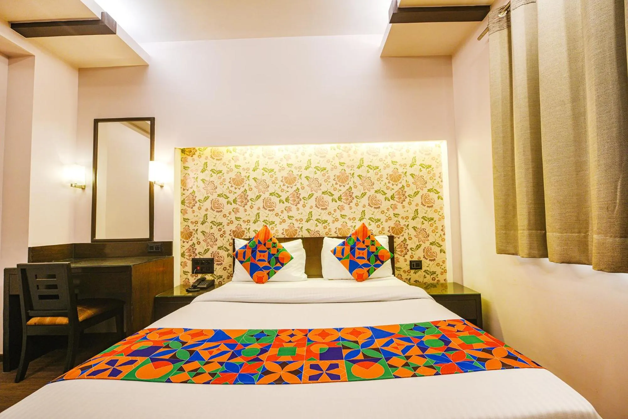 Bed in FabHotel Aashraye