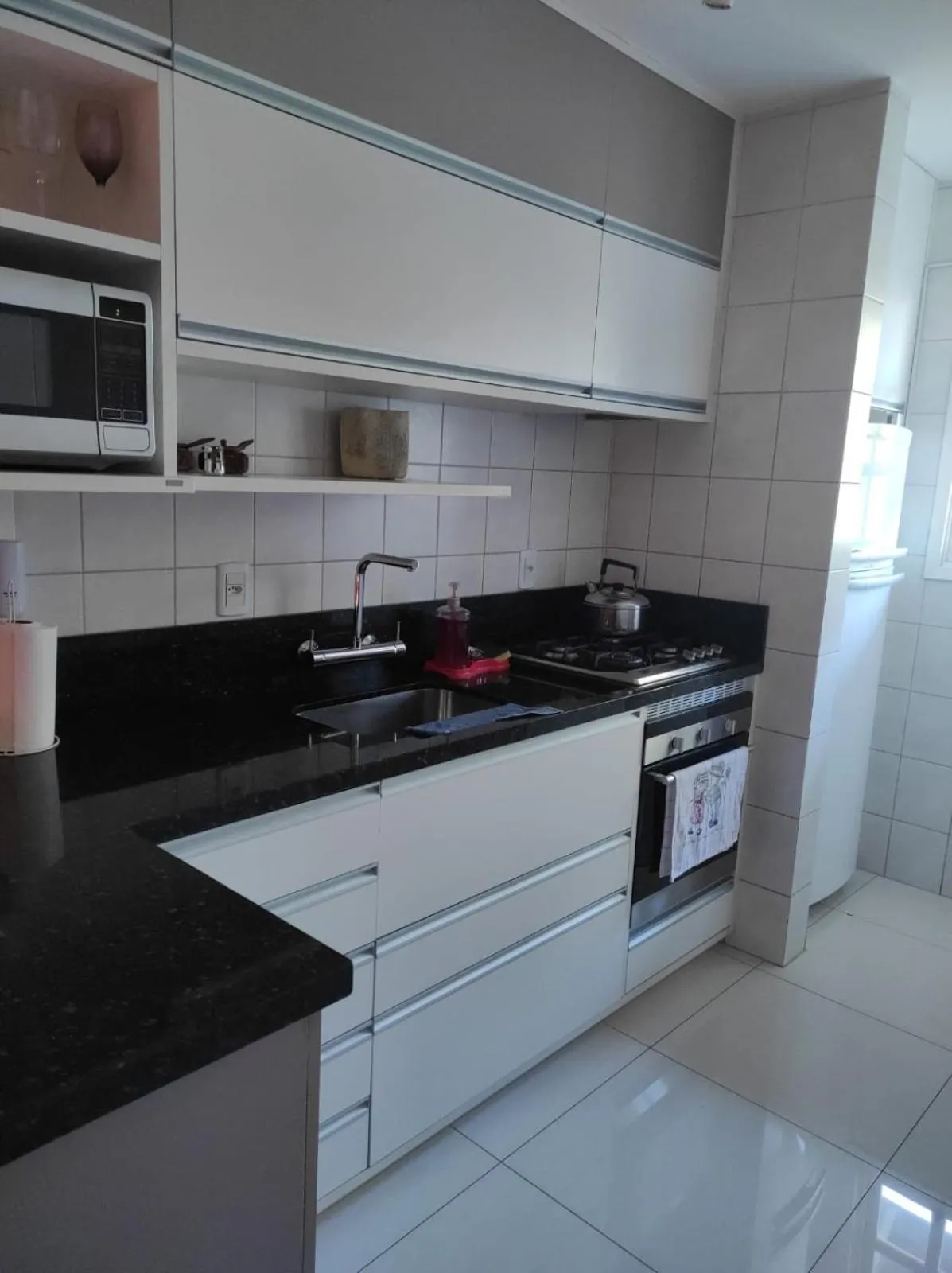 Kitchen or kitchenette in Duplex em Gramado
