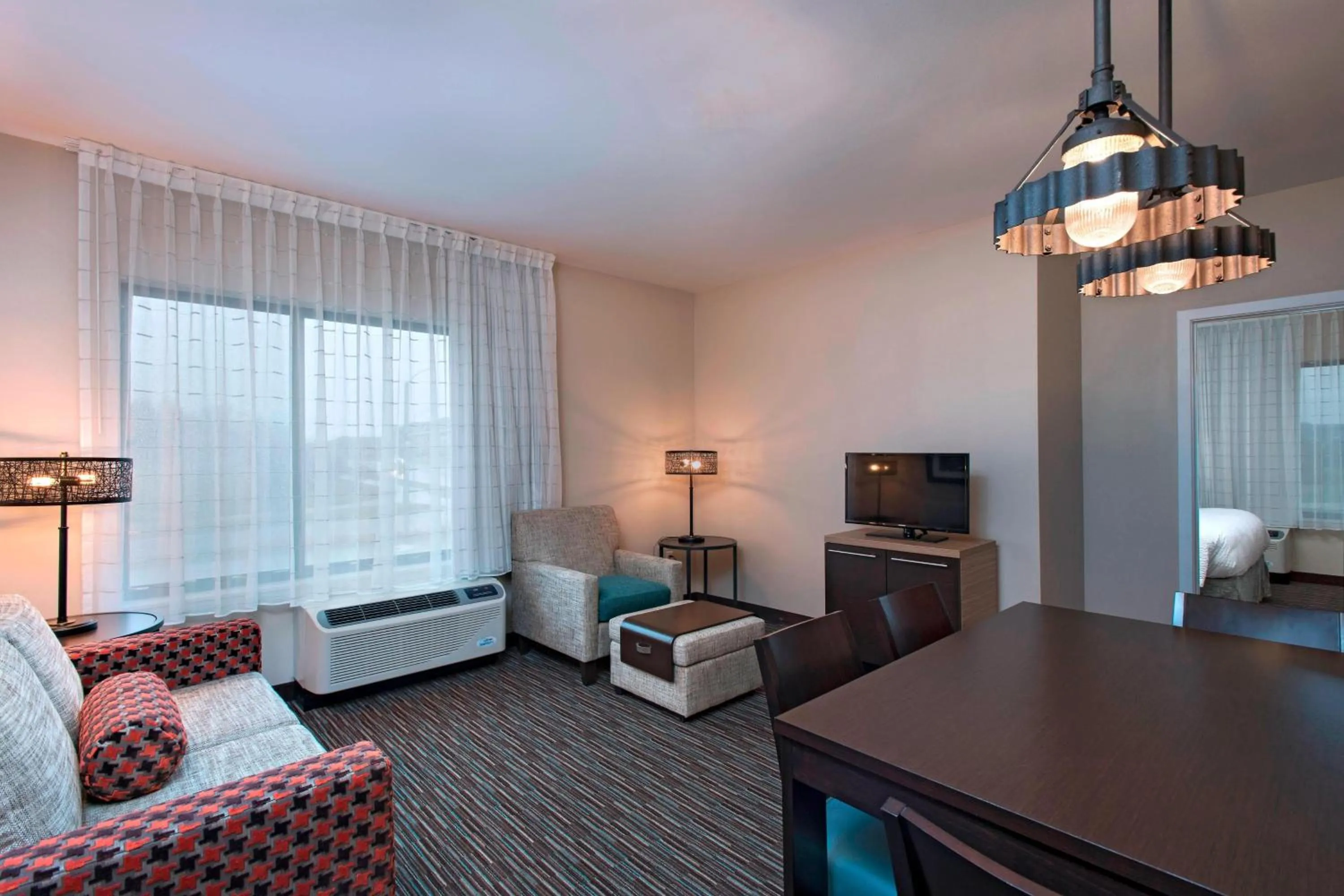 Living room, Bed in TownePlace Suites by Marriott Des Moines West/Jordan Creek