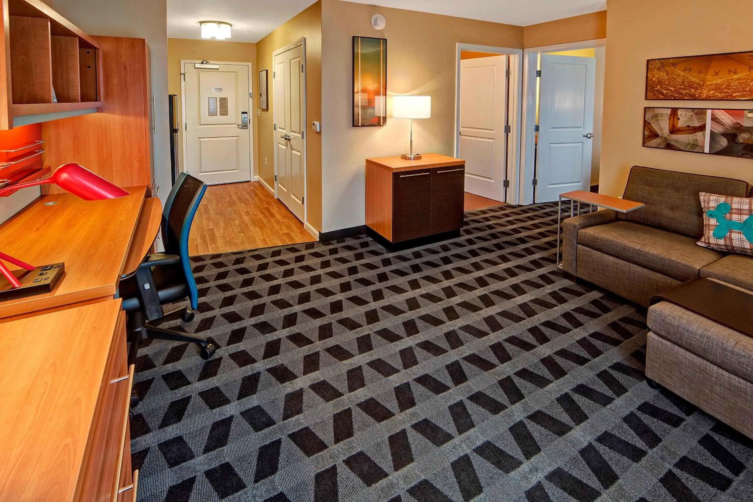 Living room, Bed in TownePlace Suites by Marriott Hattiesburg